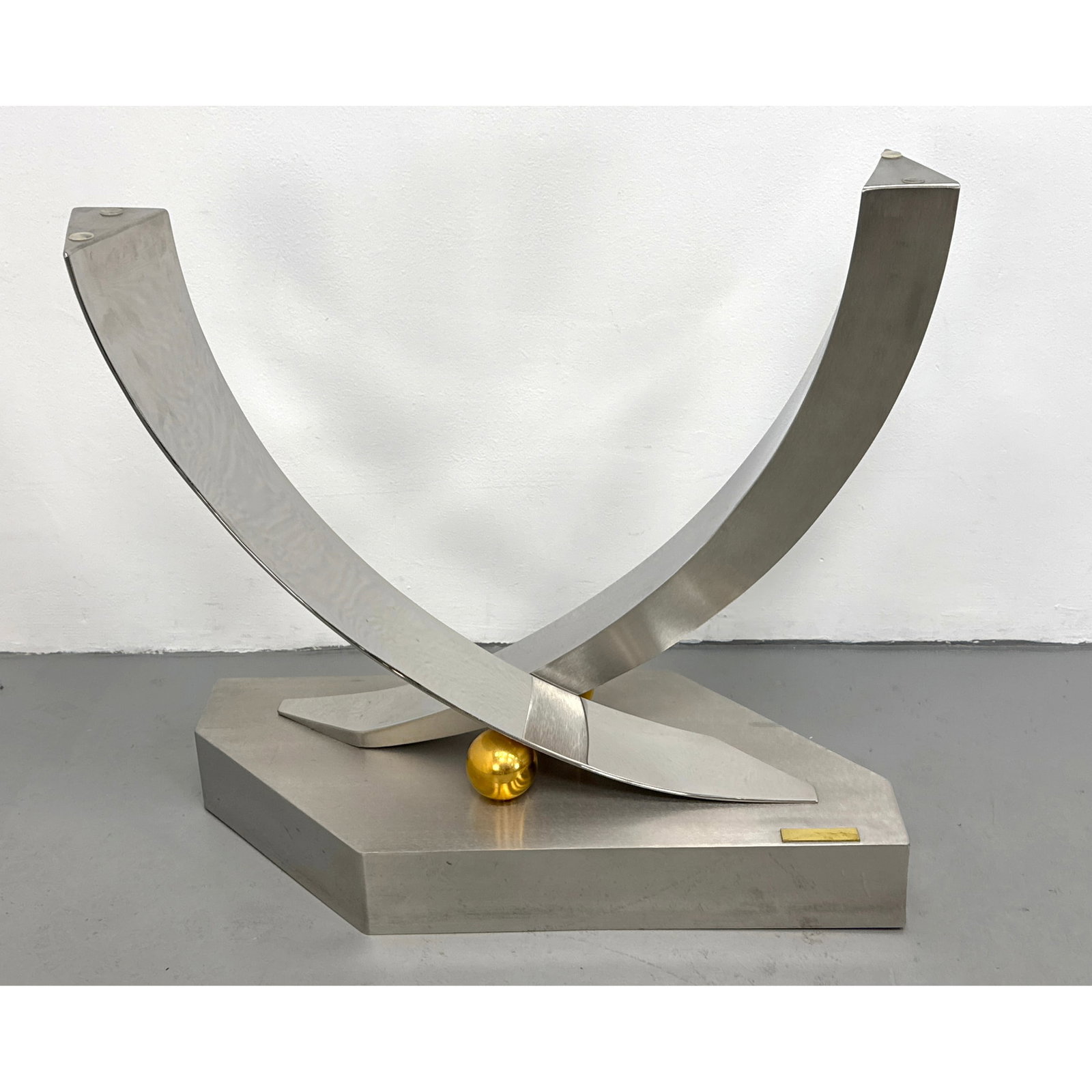 Greg Sheres Polished Stainless Steel and 24-Karat Gold Plated Brass Console Table Base. numbered.: Greg Sheres Polished Stainless Steel and 24-Karat Gold Plated Brass Console Table Base. numbered. Dimensions: Height: 28.25 inches, Width: 31 inches, Depth: 14.5 inches. ---