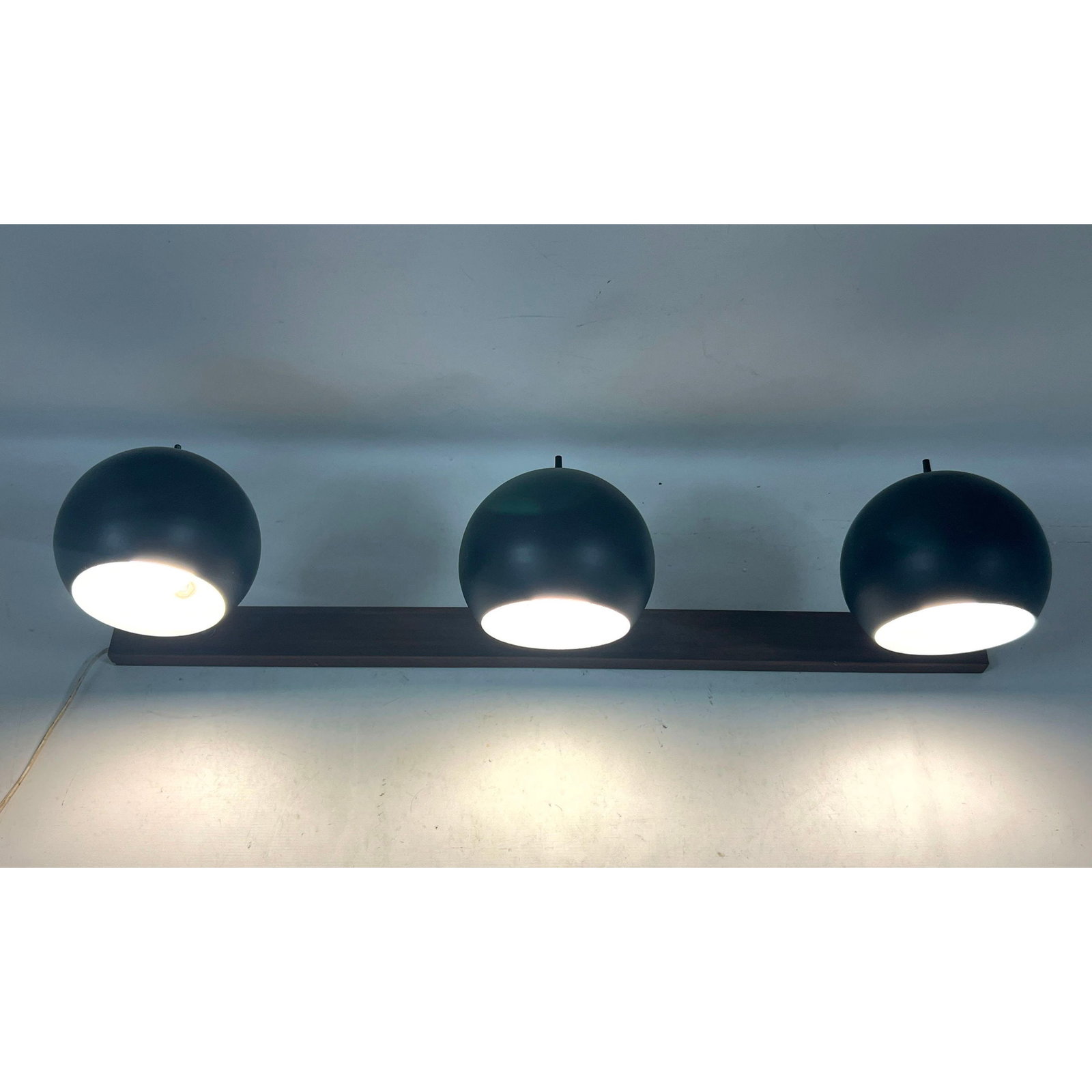 Mid Century Modern 3 Light Eyeball Wall Sconce with Walnut Backing and Adjustable Matte Black Metal (1 of 12)