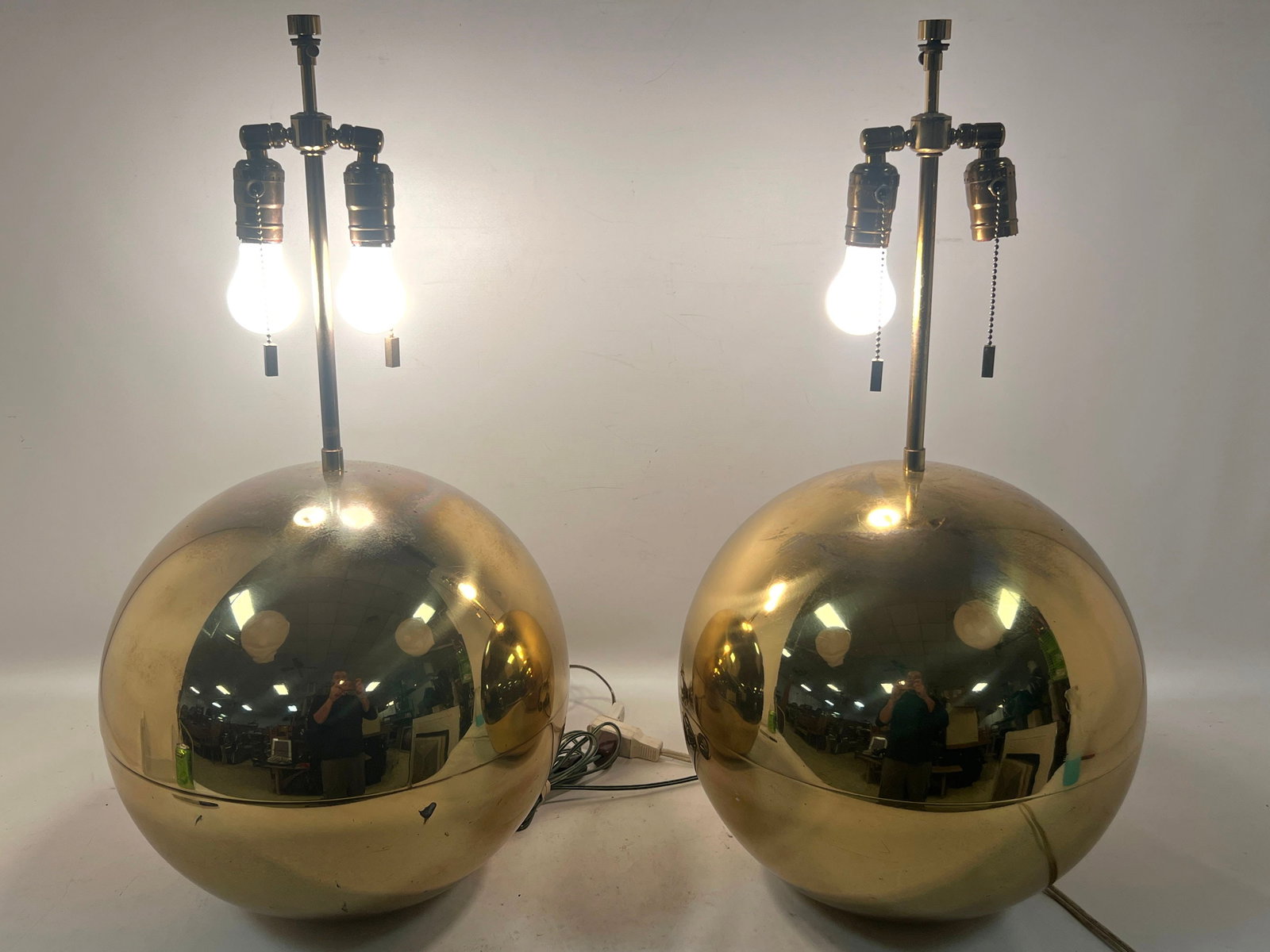 Pair of Oversized Mid Century Modern Brass Plated Spherical Table Lamps in the Style of Laurel or So: Pair of Oversized Mid Century Modern Brass Plated Spherical Table Lamps in the Style of Laurel or Sonneman Dimensions: Height: 28 inches, Width: 15 inches, Depth: 15 inches. --- US Packing and