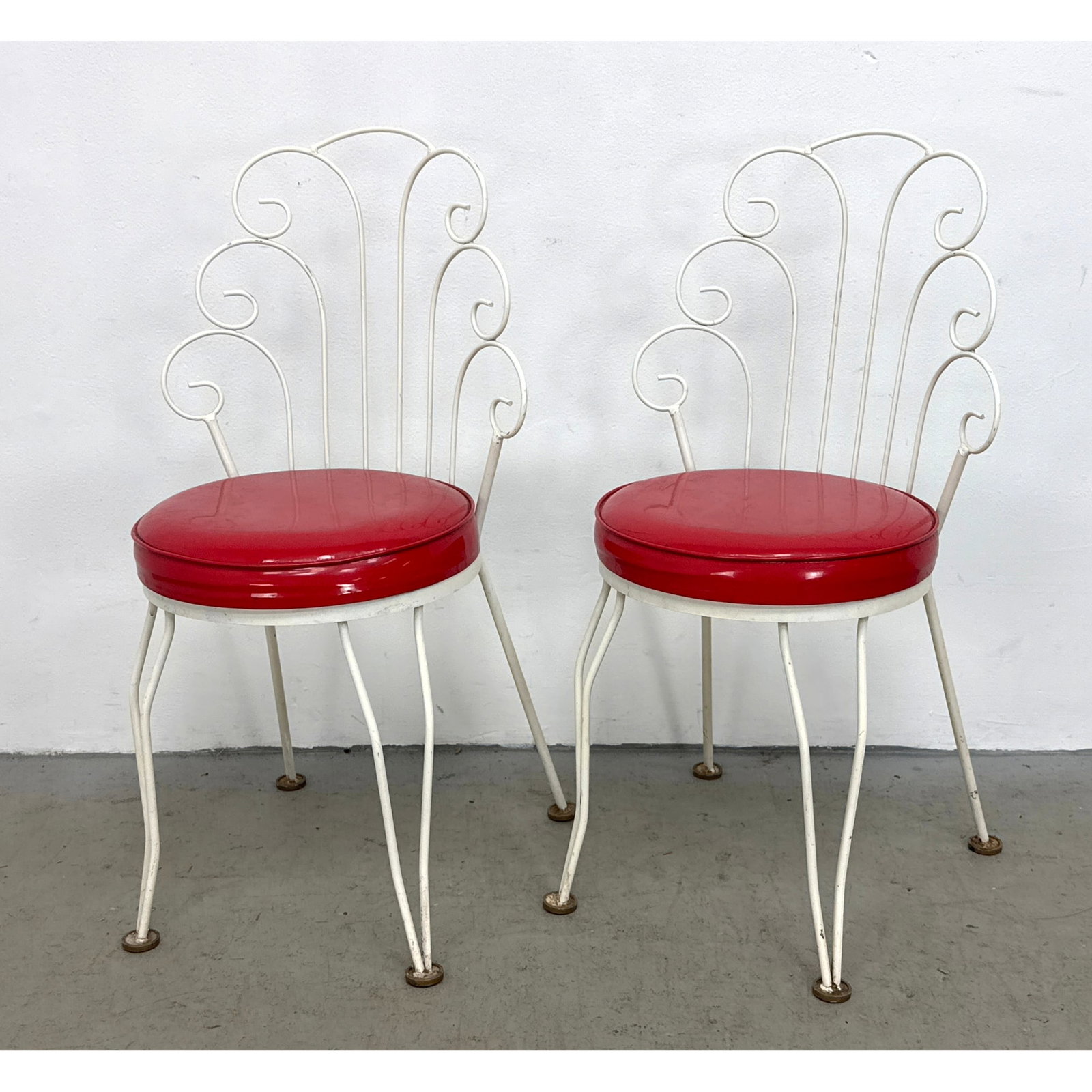 Pr Antarenni Wrought Iron Manufacturing Corp White Painted Peacock Back Side Chairs with Red Vinyl S: Pr Antarenni Wrought Iron Manufacturing Corp White Painted Peacock Back Side Chairs with Red Vinyl Seats Dated 1968 Dimensions: Height: 33.5 inches, Width: 17 inches, Depth: 17 inches. - Seat Height: 
