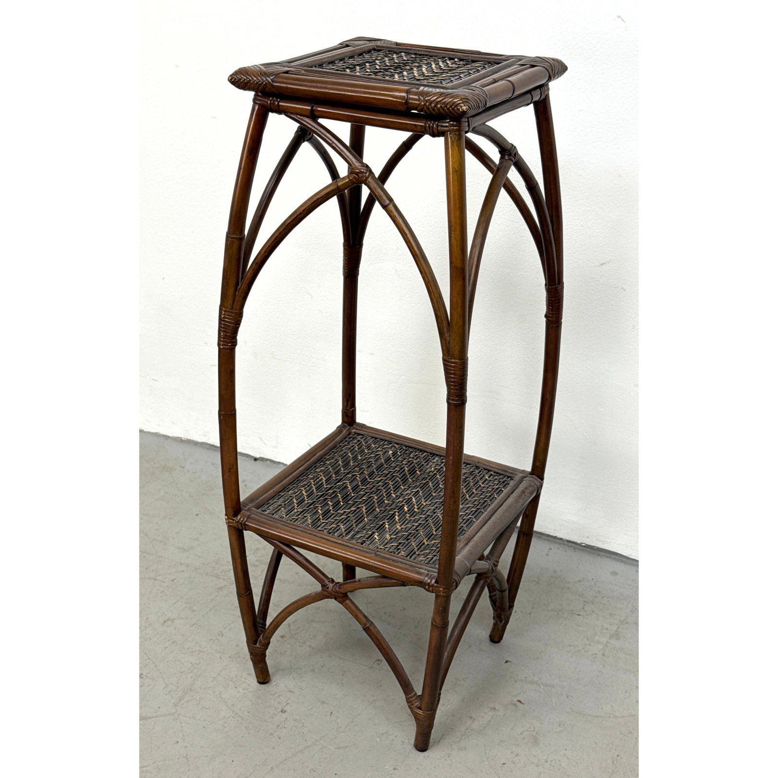 2-Tier Bamboo and Rattan Pedestal Plant Stand with Woven Herringbone Panels and Gothic Arch Supports (1 of 10)