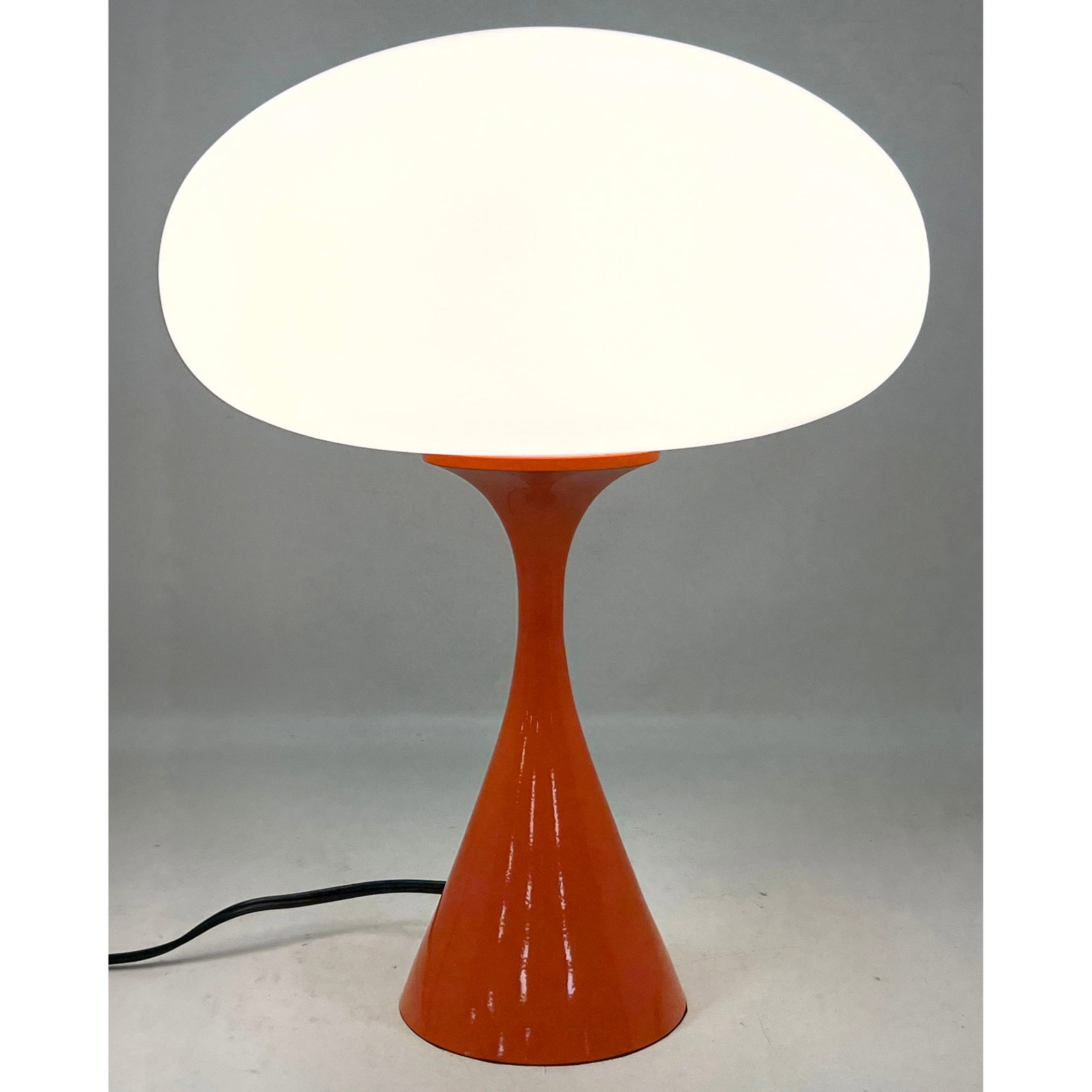 DESIGNLINE Orange Enameled Base Glass Mushroom Shade Table Lamp. Paper Label. StemLite. Contemporary: DESIGNLINE Orange Enameled Base Glass Mushroom Shade Table Lamp. Paper Label. StemLite. Contemporary Lighting. Dimensions: Height: 17 inches, Width: 12 inches, Depth: 12 inches. --- US Packing and Shi