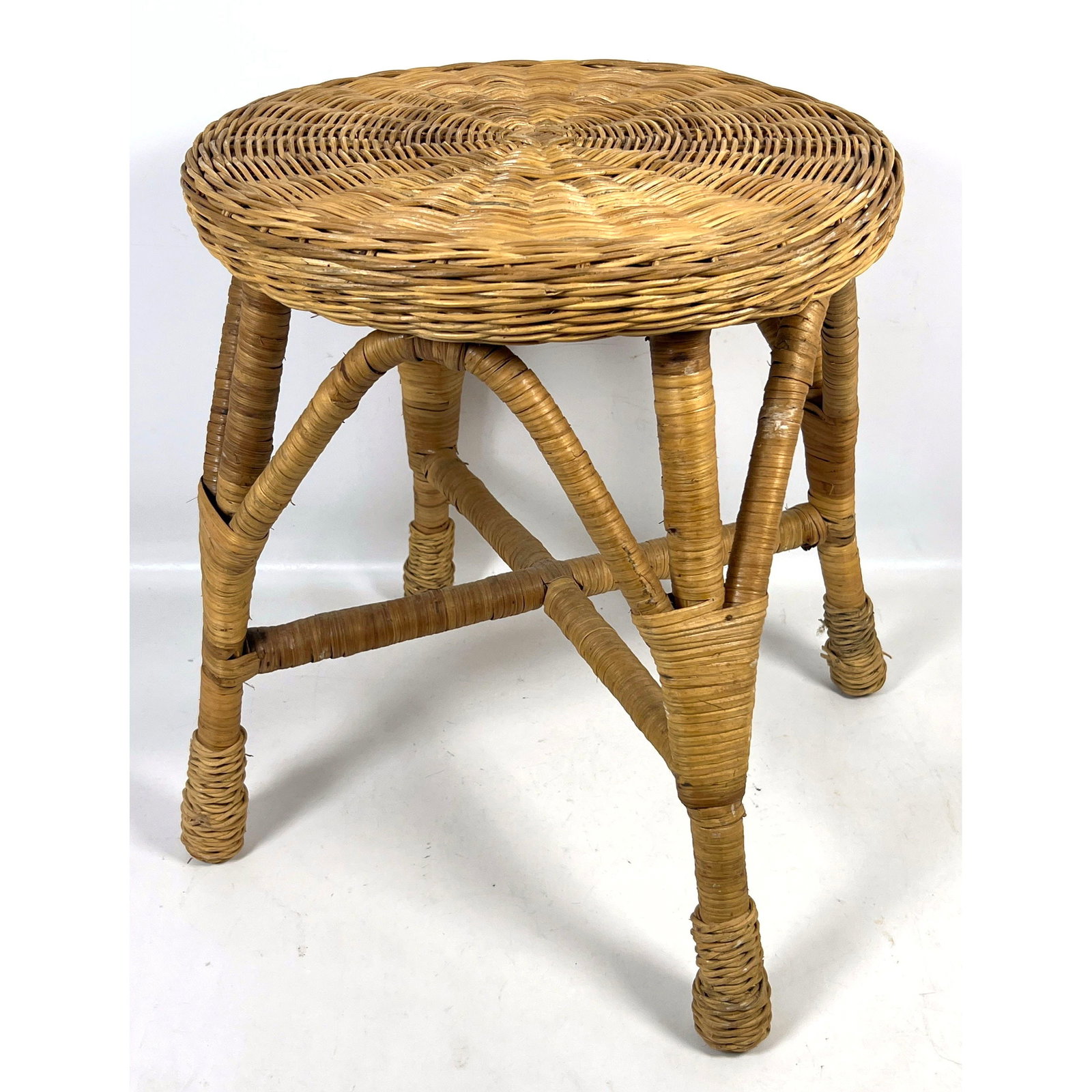 Vintage Mid-Century Modern Round Woven Wicker and Rattan Vanity Foot Stool with X-Form Stretcher: Vintage Mid-Century Modern Round Woven Wicker and Rattan Vanity Foot Stool with X-Form Stretcher Dimensions: Height: 18.5 inches, Width: 16 inches, Depth: 16 inches. ---