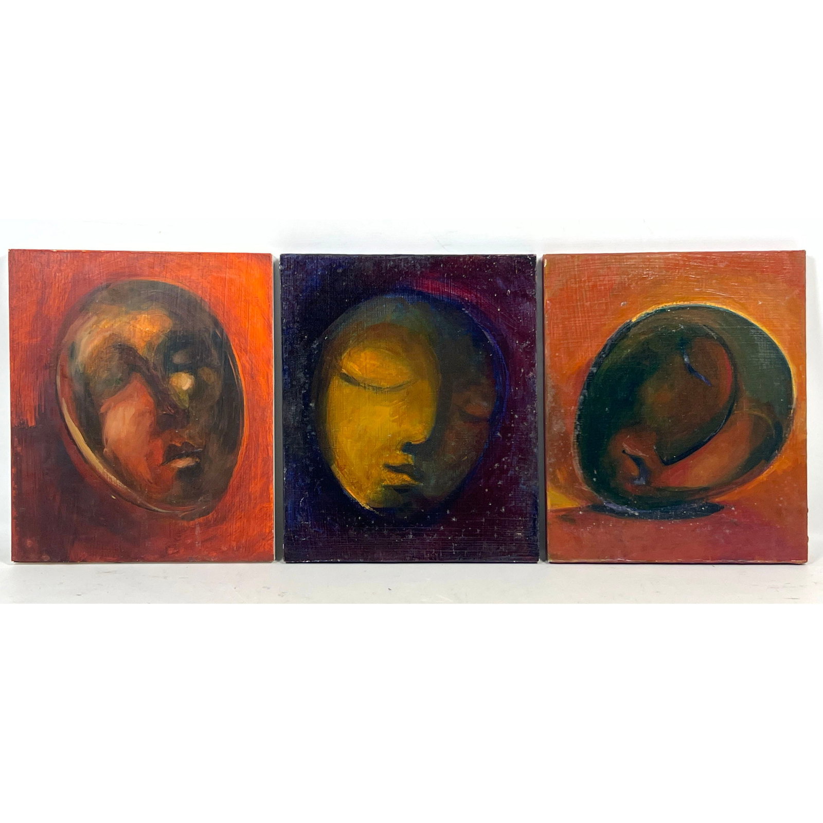 3pc lot of Modernist Oil on Wood Panel Paintings depicting Stylized Egg Shaped Faces with Closed Eye: 3pc lot of Modernist Oil on Wood Panel Paintings depicting Stylized Egg Shaped Faces with Closed Eyes Dimensions: Height: 12 inches, Width: 10 inches. --- US Packing and Shipping charge: In house ship