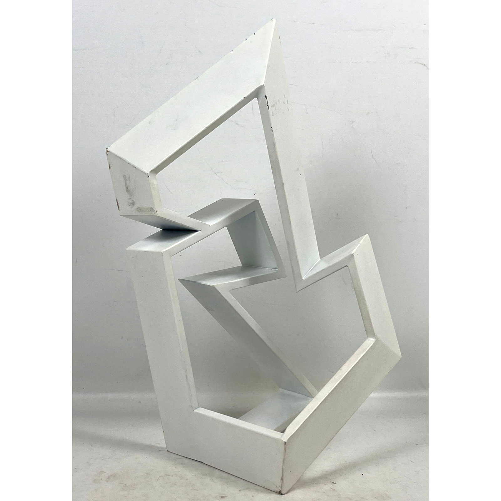 White Enamel Painted Metal Table Sculpture. Geometric puzzle design. Can be Set horizontal or Vertic: White Enamel Painted Metal Table Sculpture. Geometric puzzle design. Can be Set horizontal or Vertical. Dimensions: Height: 8 inches, Width: 17.5 inches, Depth: 7 inches. --- US Packing and Shipping c