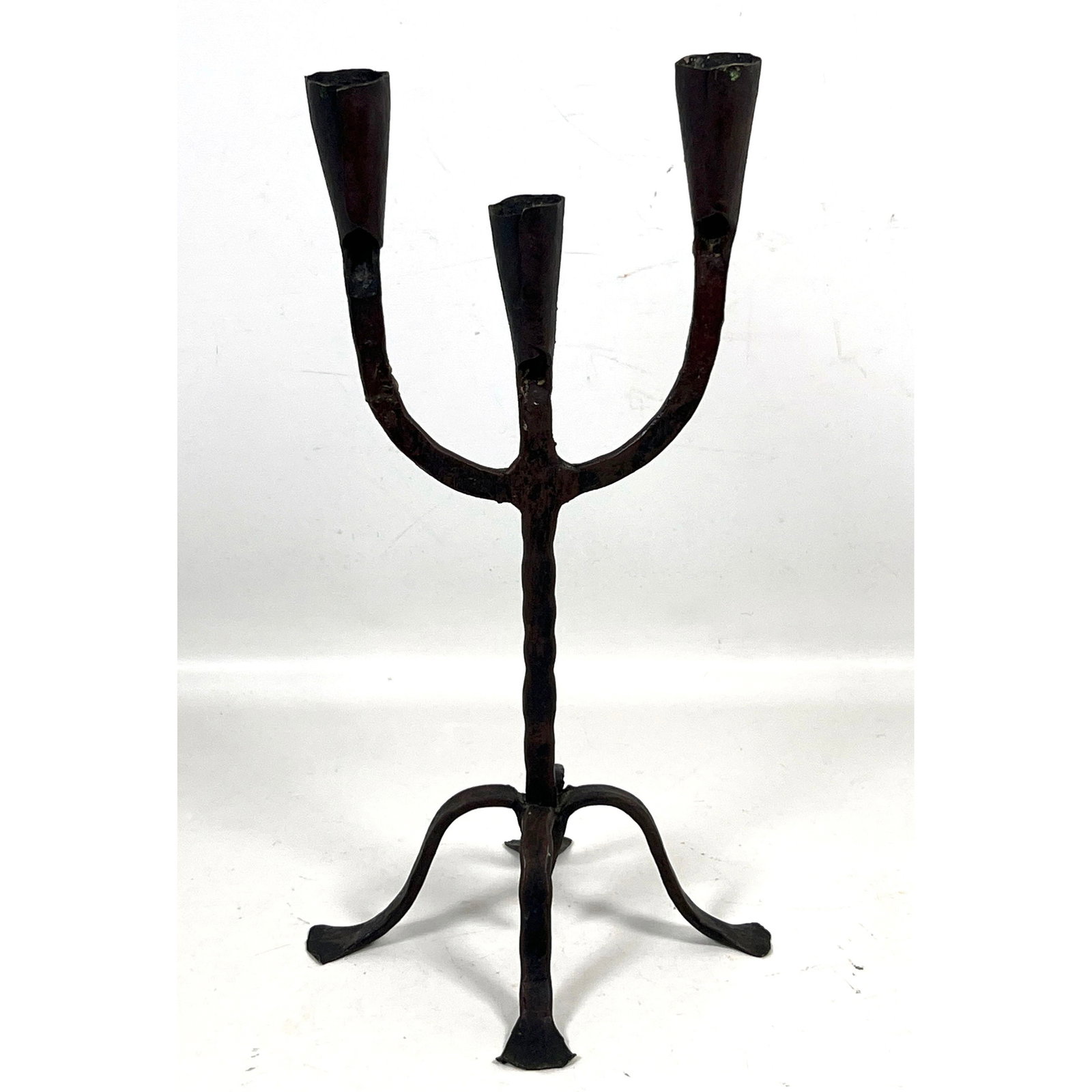 Hand forged wrought iron 3 light candelabrum with quadrupod base and hammered finish in the style of (1 of 8)