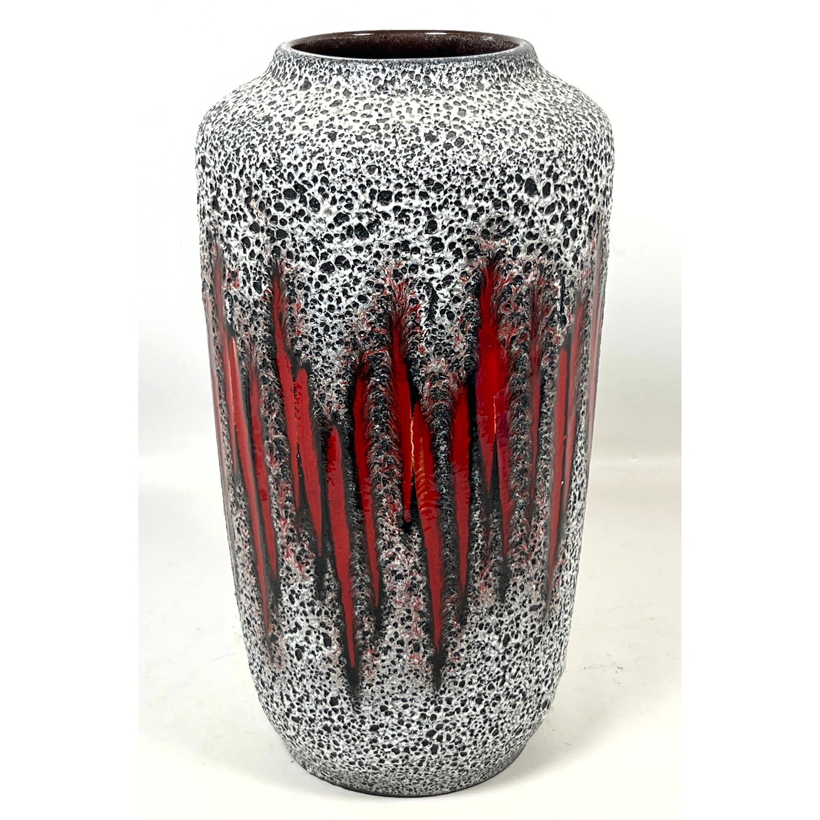 Scheurich West Germany Art Pottery Floor Vase: Fat White Volcanic Glaze on black ground with red cla: Scheurich West Germany Art Pottery Floor Vase: Fat White Volcanic Glaze on black ground with red claw marks. Marked: W. Germany 517-38. Dimensions: Height: 15 inches, Width: 8 inches, Depth: 8 inches.