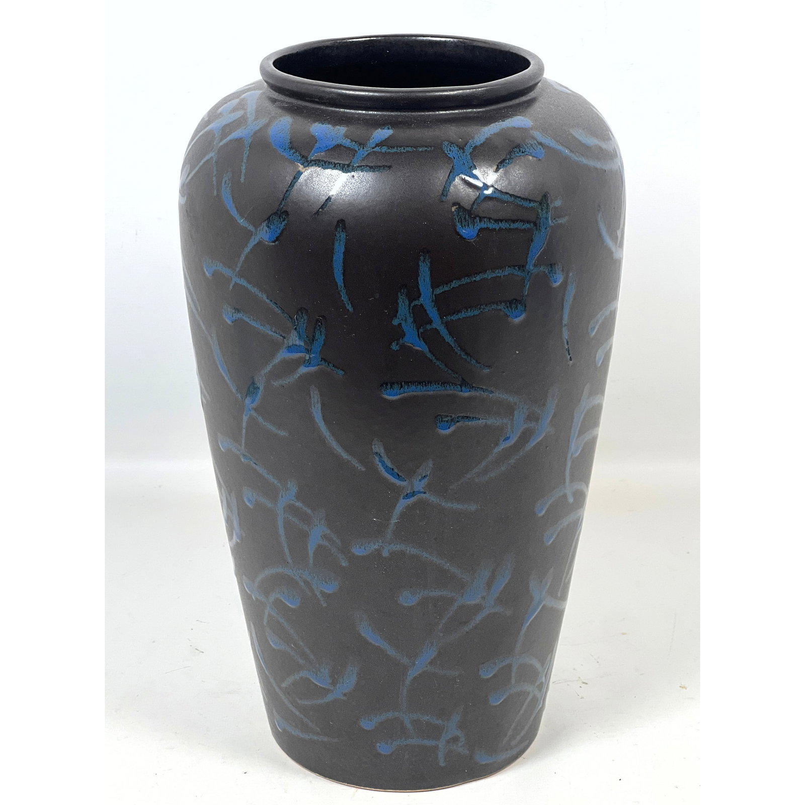 Scheurich West Germany Art Pottery Floor Vase: Random Blue Markings on a Matte Black Ground: Scheurich West Germany Art Pottery Floor Vase: Random Blue Markings on a Matte Black Ground Dimensions: Height: 15 inches, Width: 9 inches, Depth: 9 inches. --- US Packing and Shipping charge: In hous
