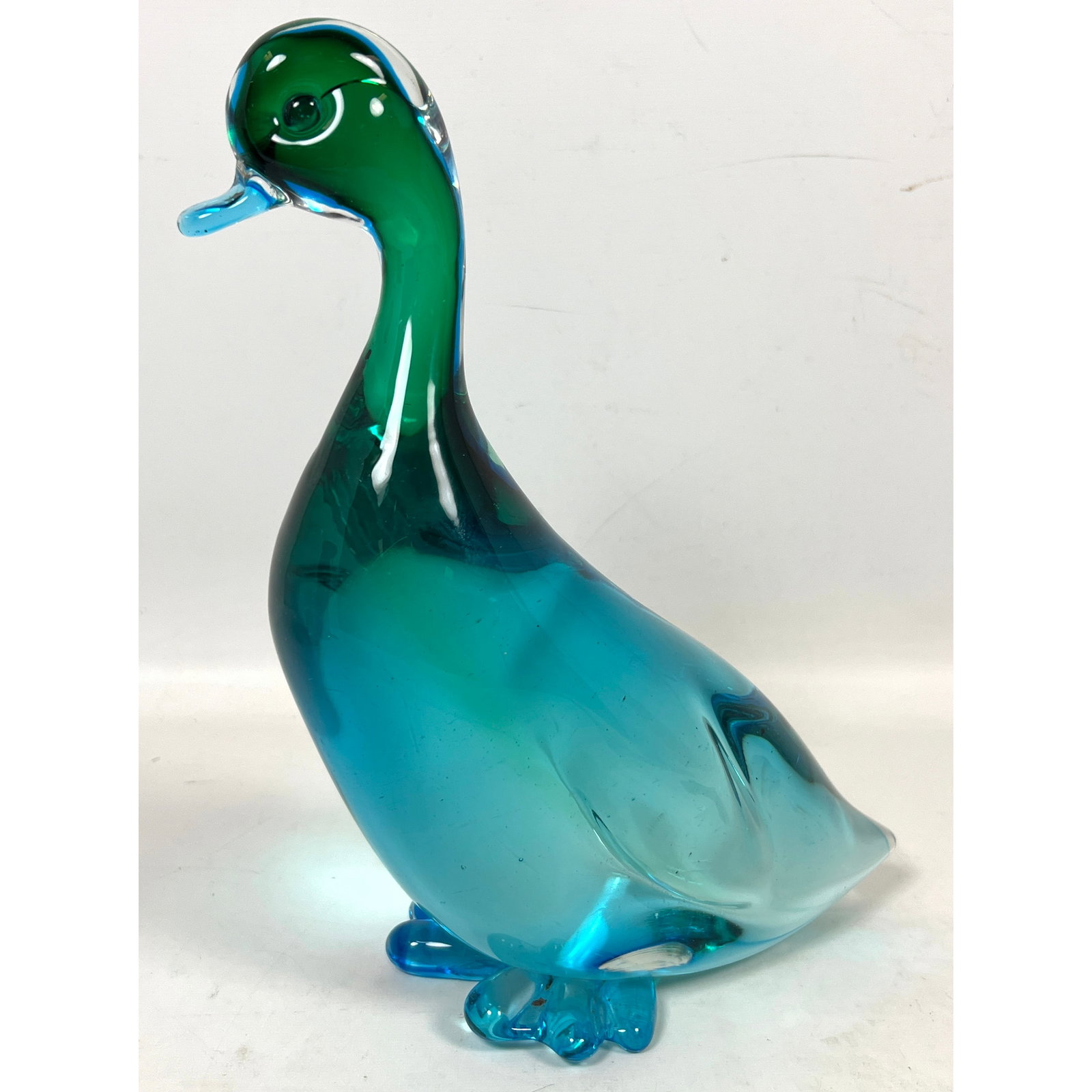 Murano Sommerso Art Glass Duck Figurine. Emerald Green and Teal Blue. Unsigned.: Murano Sommerso Art Glass Duck Figurine. Emerald Green and Teal Blue. Unsigned. Dimensions: Height: 10.5 inches, Width: 9 inches, Depth: 4 inches. --- US Packing and Shipping charge: In house shipping