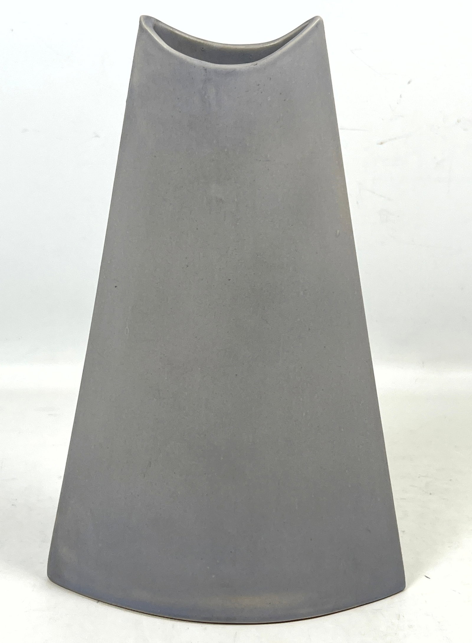 James Johnston Studio Pottery Matte Gray Stoneware Vase. Tapered Lenticular Form with Concave Rim. D: James Johnston Studio Pottery Matte Gray Stoneware Vase. Tapered Lenticular Form with Concave Rim. Dated 1981. Dimensions: Height: 13 inches, Width: 8.5 inches, Depth: 3.5 inches. --- US Packing and S