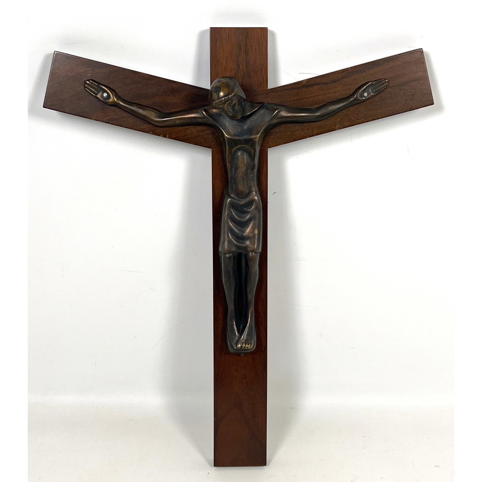 Mid Century Modernist Artisan Bronze and Rosewood Crucifix, Label Marxhausen by Chris Vogel.: Mid Century Modernist Artisan Bronze and Rosewood Crucifix, Label Marxhausen by Chris Vogel. Dimensions: Height: 19 inches, Width: 15 inches, Depth: 2.5 inches. --- US Packing and Shipping charge: In 