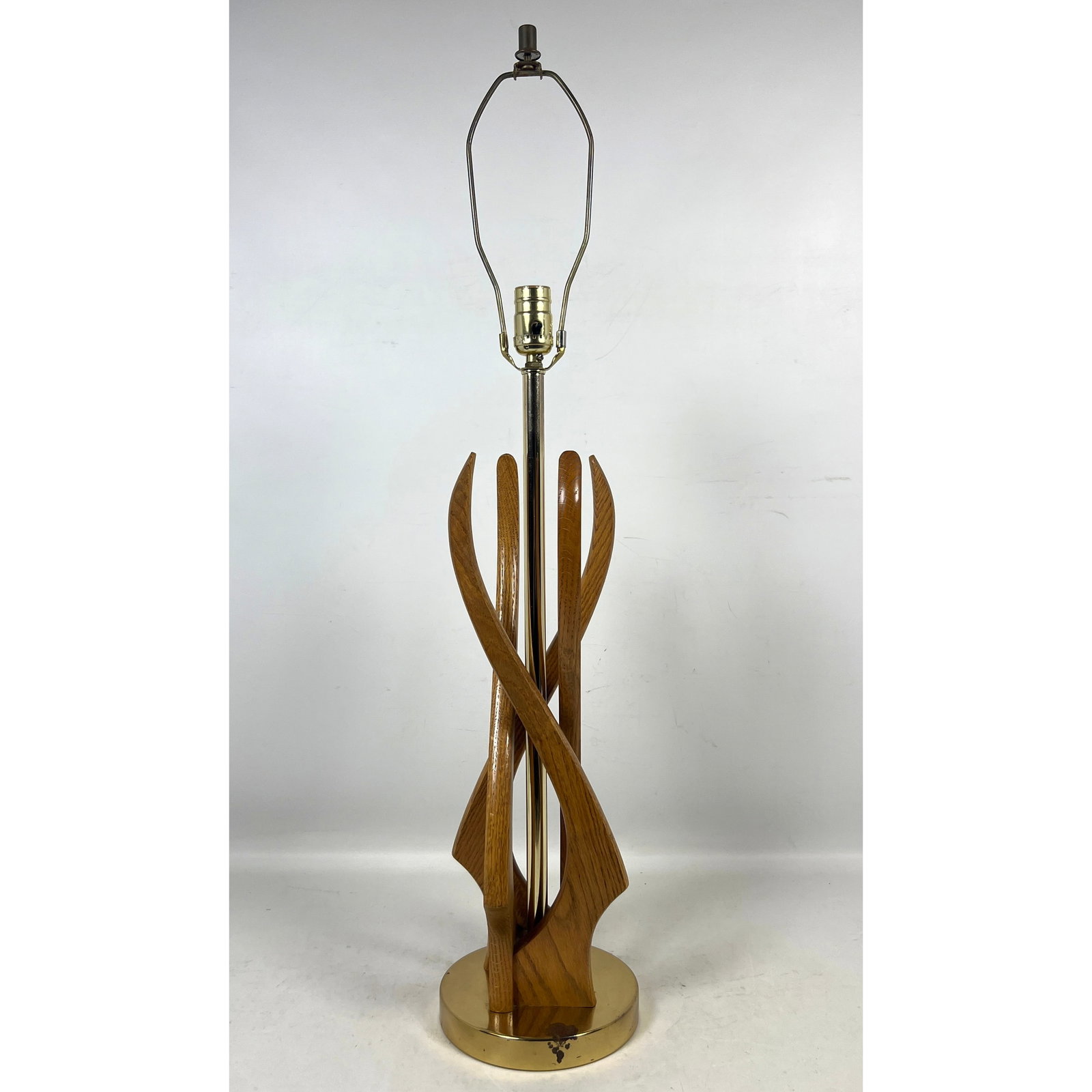 Mid-Century Modern sculptural wood table lamp in the style of Modeline of California.: Mid-Century Modern sculptural wood table lamp in the style of Modeline of California. Dimensions: Height: 34 inches, Width: 7 inches, Depth: 7 inches. --- US Packing and Shipping charge: In house