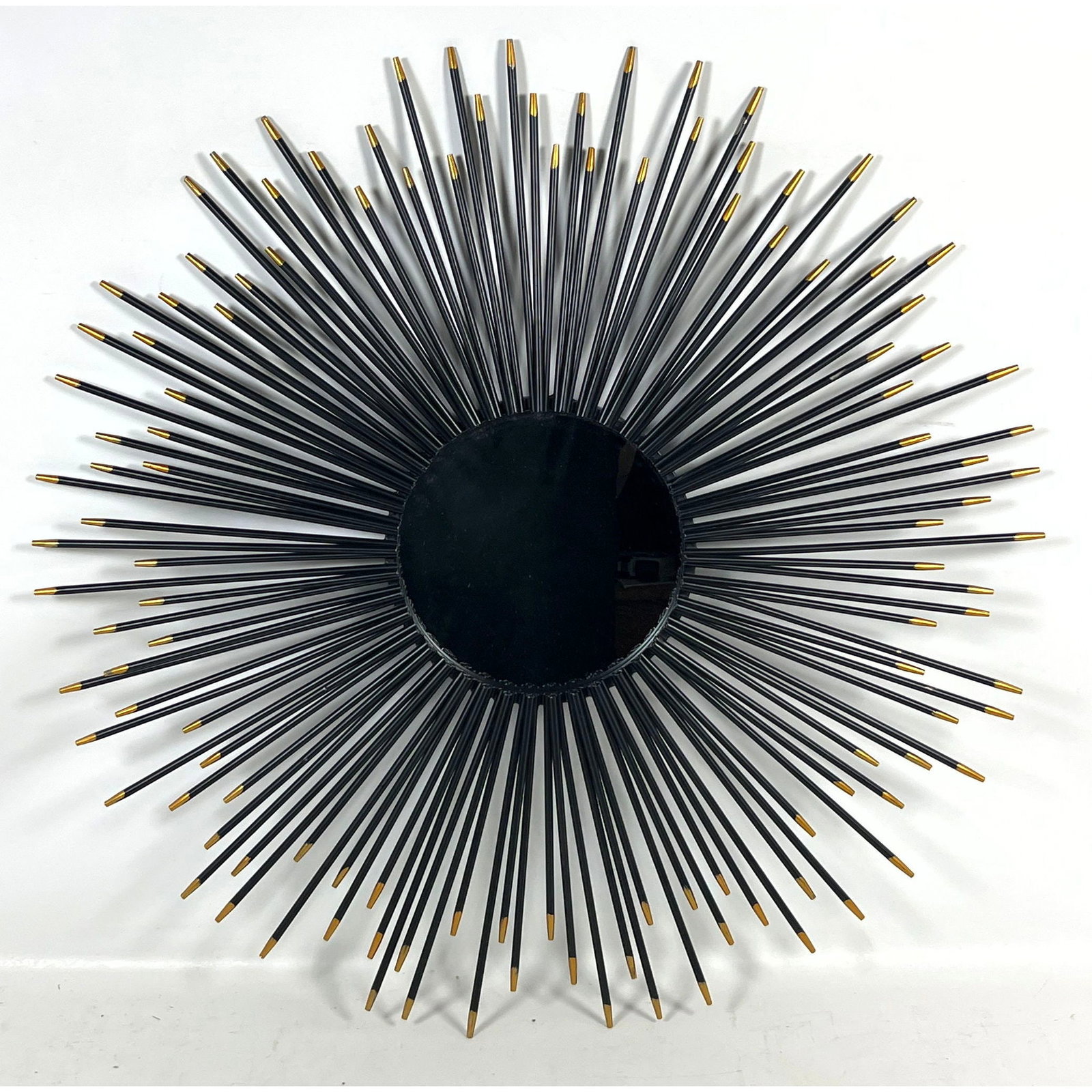 Contemporary Sunburst wall mirror with matte black metal spokes and gold toned painted tips (1 of 9)