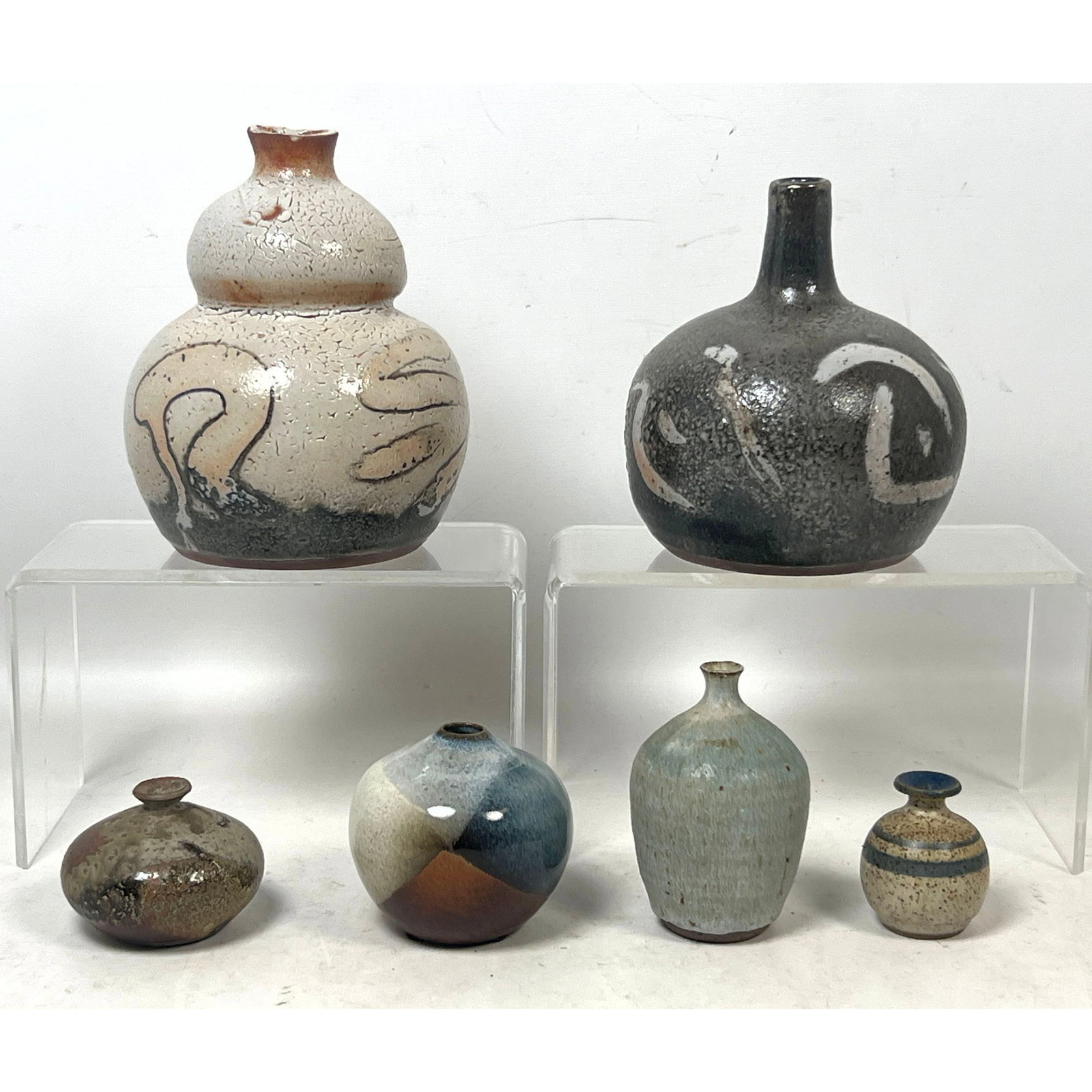 6pc lot of Mid Century Modern Studio Art Pottery Stoneware Vases signed Szaner, Bornhart, Sager, and: 6pc lot of Mid Century Modern Studio Art Pottery Stoneware Vases signed Szaner, Bornhart, Sager, and Aru. Dimensions: Height: 6.5 inches, Width: 5.5 inches, Depth: 5.5 inches. --- US Packing and Shipp