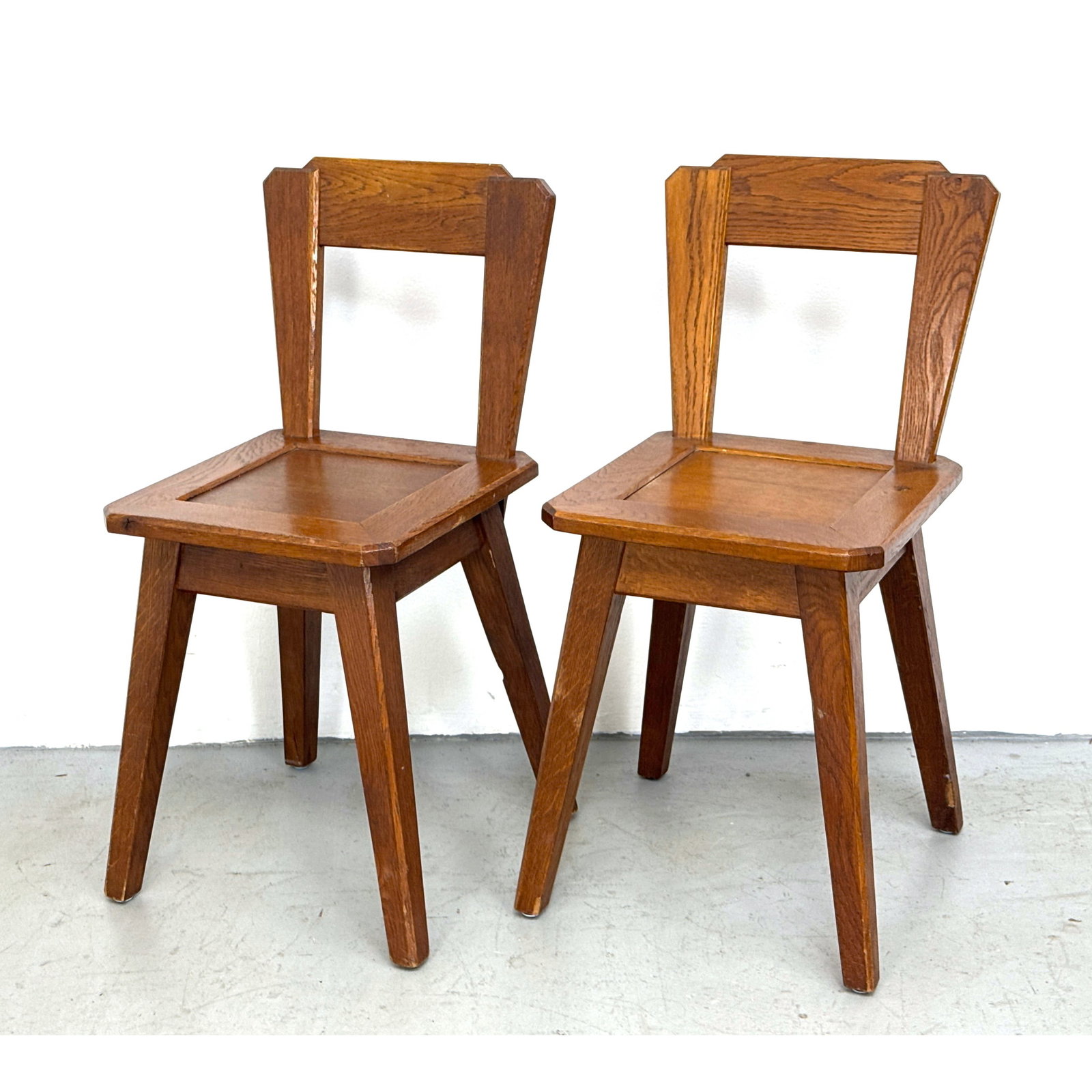 Pair 1950s Constructivist style oak side chairs. Dutch style.: Pair 1950s Constructivist style oak side chairs. Dutch style. Dimensions: Height: 30 inches, Width: 14 inches, Depth: 14 inches. - Seat Height: 17.5 inches ---