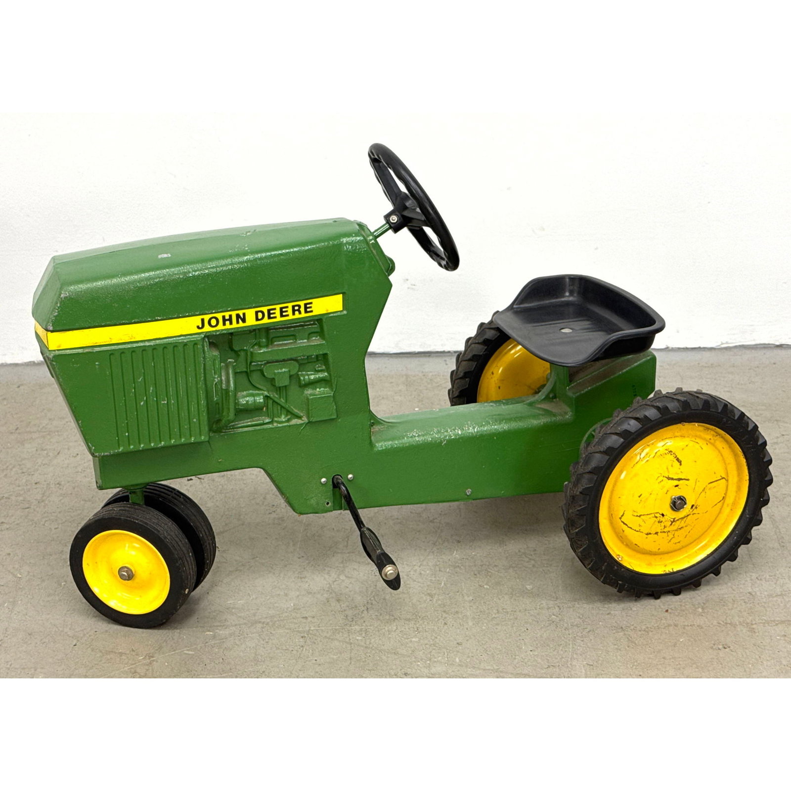 John Deere Ertl Model 520 Pedal Tractor pedal car: John Deere Ertl Model 520 Pedal Tractor pedal car Dimensions: Height: 24.5 inches, Width: 37 inches, Depth: 19 inches. ---