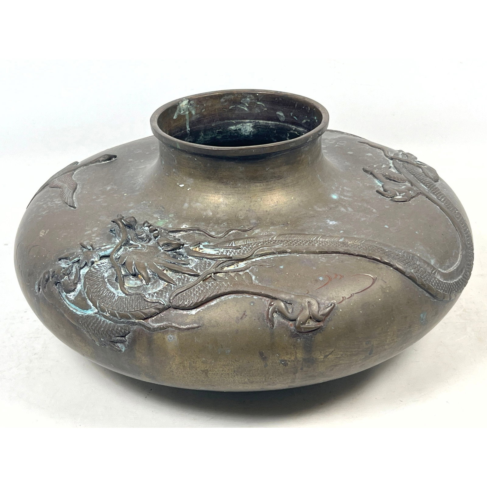 Large Japanese Meiji Style Bronze Jardiniere Vase with High Relief Dragon and Crane Decoration. Unsi: Large Japanese Meiji Style Bronze Jardiniere Vase with High Relief Dragon and Crane Decoration. Unsigned. Dimensions: Height: 8 inches, Width: 16 inches, Depth: 16 inches. ---