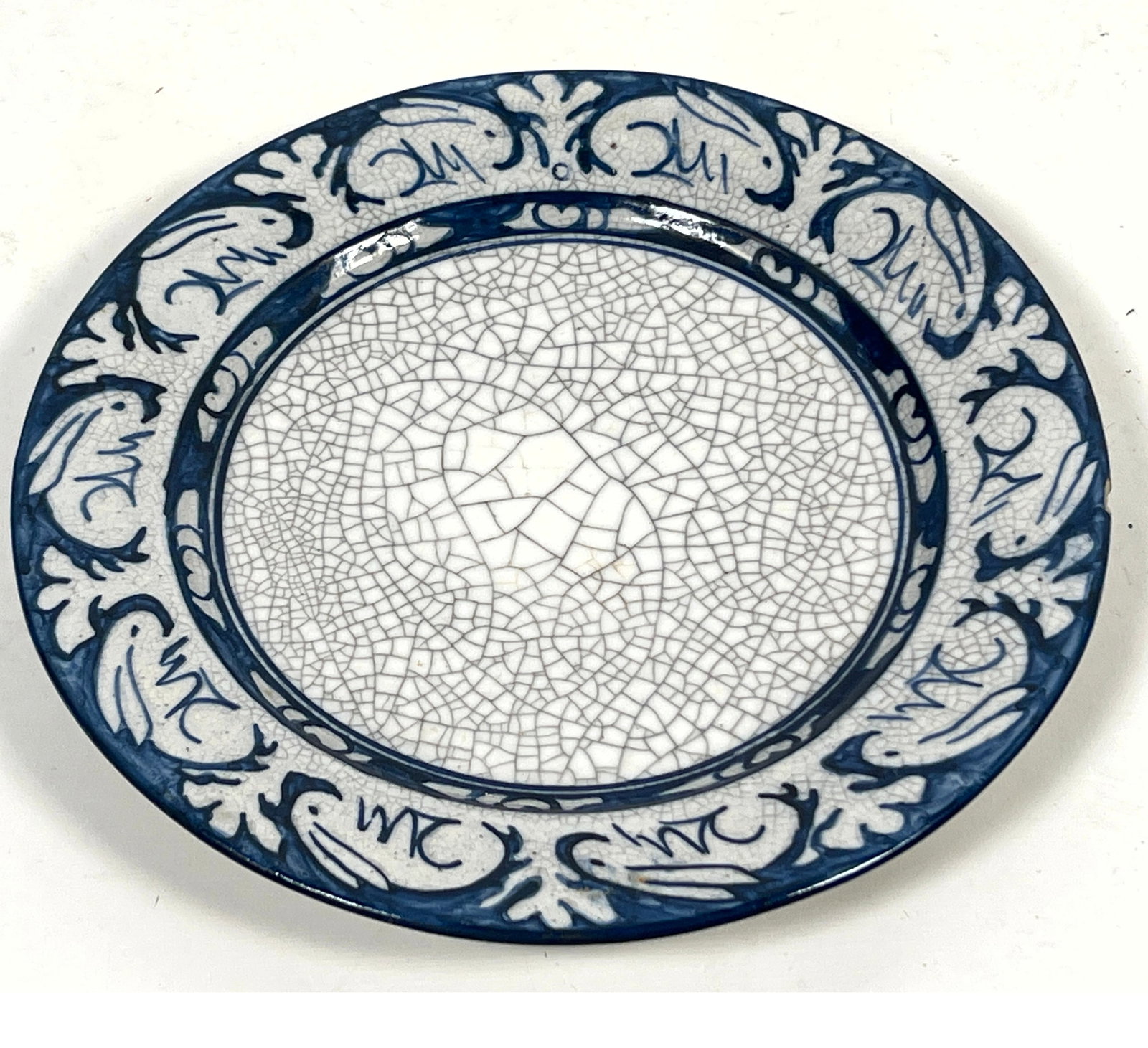 Dedham Crackleware Plate: Blue Rabbit pattern decorated by Maud Davenport. Marked with cobalt stamp (1 of 6)