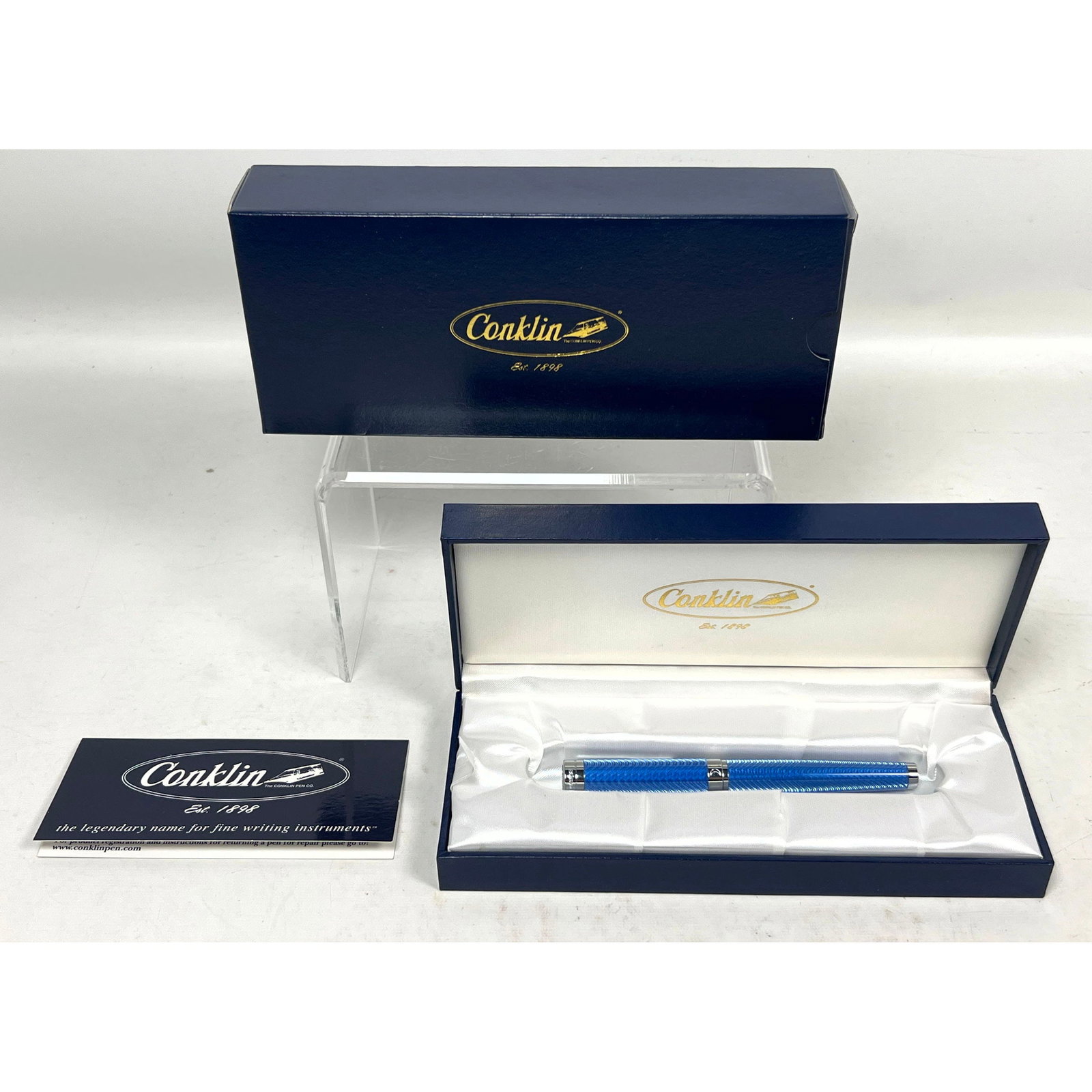 Conklin Herringbone Blue Lacquer Guilloche Pattern Fountain Pen with Medium Two Tone Nib and Origina: Conklin Herringbone Blue Lacquer Guilloche Pattern Fountain Pen with Medium Two Tone Nib and Original Box Dimensions: Height: 2 inches, Width: 4 inches, Depth: 9 inches. --- US Packing and Shipping ch