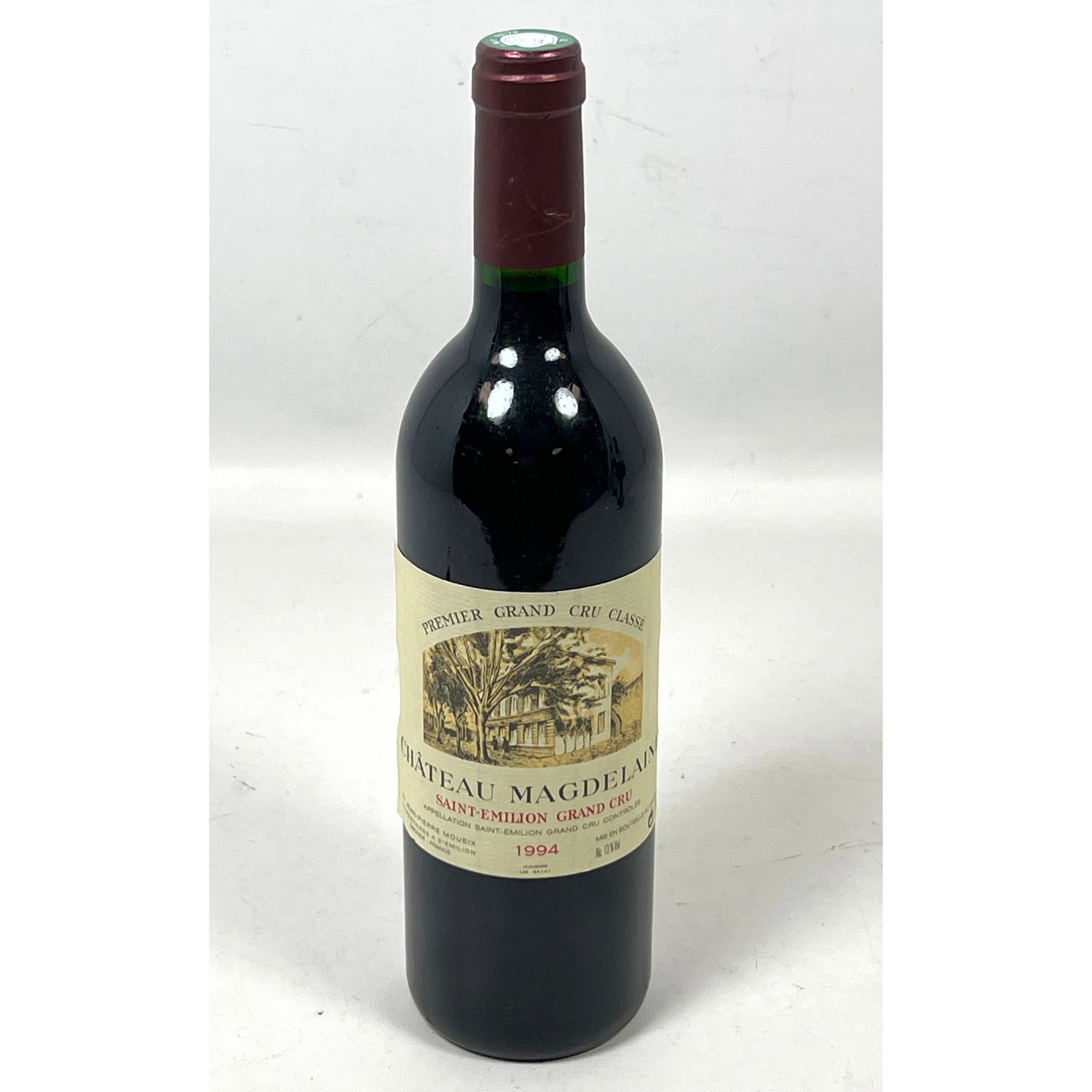 1994 Chateau Magdelaine, 750ml a red wine from the Saint-emilion Premier Grand Cru Classe appellatio: 1994 Chateau Magdelaine, 750ml a red wine from the Saint-emilion Premier Grand Cru Classe appellation in Bordeaux, France Dimensions: Height: 11 inches, Width: 3 inches, Depth: 3 inches. ---