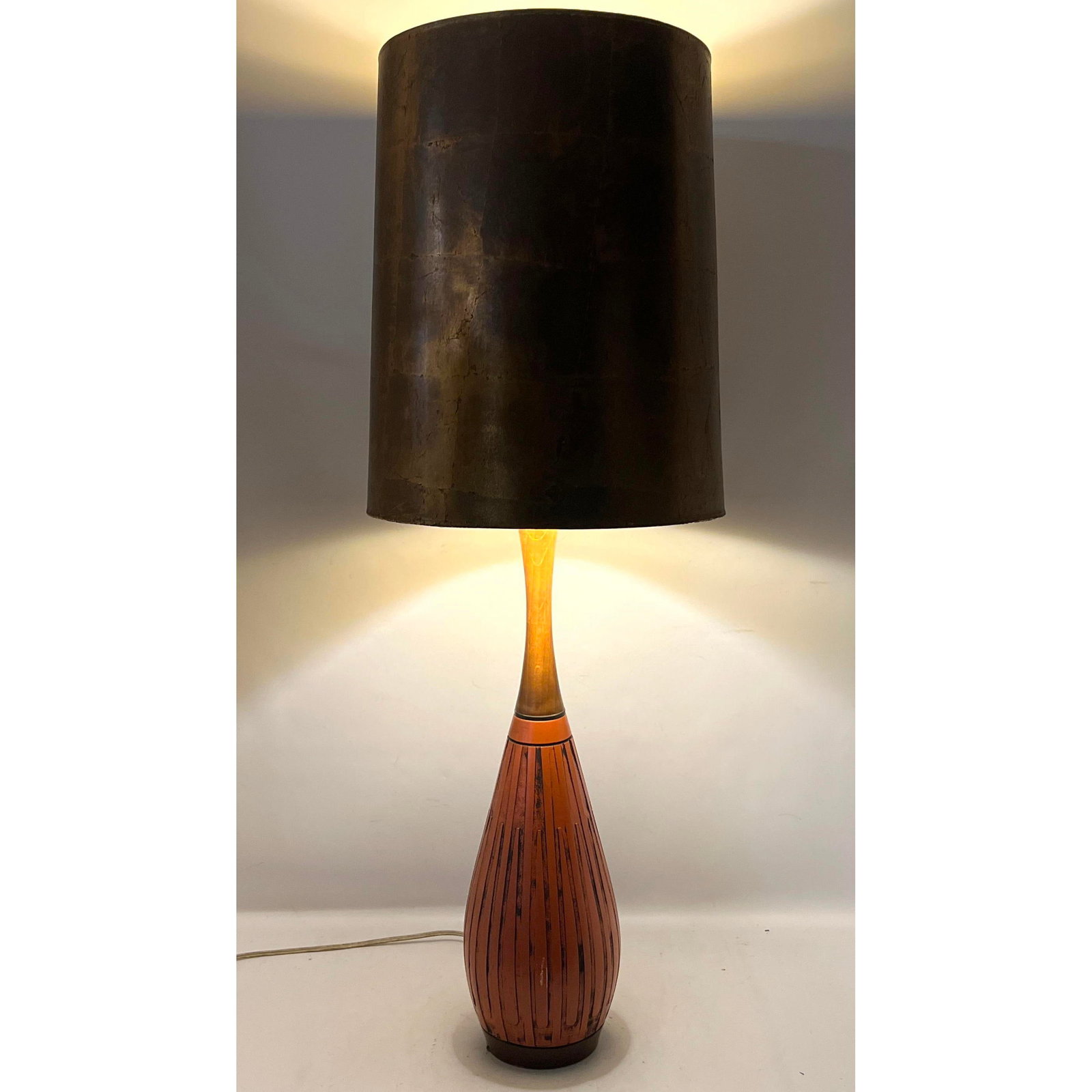 London Lamps Mid Century Modern Textured Plaster and Walnut Table Lamp with Gilded Shade: London Lamps Mid Century Modern Textured Plaster and Walnut Table Lamp with Gilded Shade Dimensions: Height: 49.75 inches, Width: 15.5 inches, Depth: 15.5 inches. --- - We offer curbside delivery for 