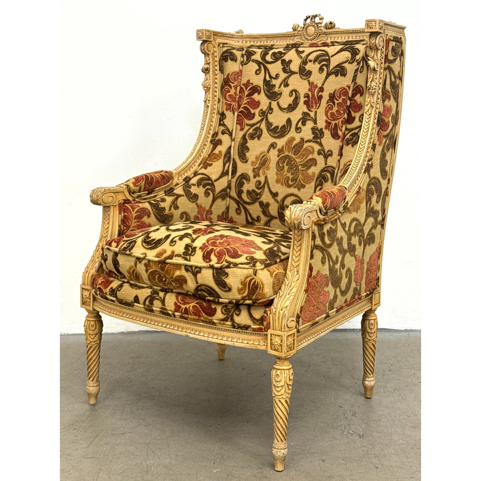 Louis XVI style wingback bergere armchair with distressed cream painted finish and floral tapestry u: Louis XVI style wingback bergere armchair with distressed cream painted finish and floral tapestry upholstery Dimensions: Height: 40.25 inches, Width: 26.5 inches, Depth: 21.5 inches. - Seat Height: 1