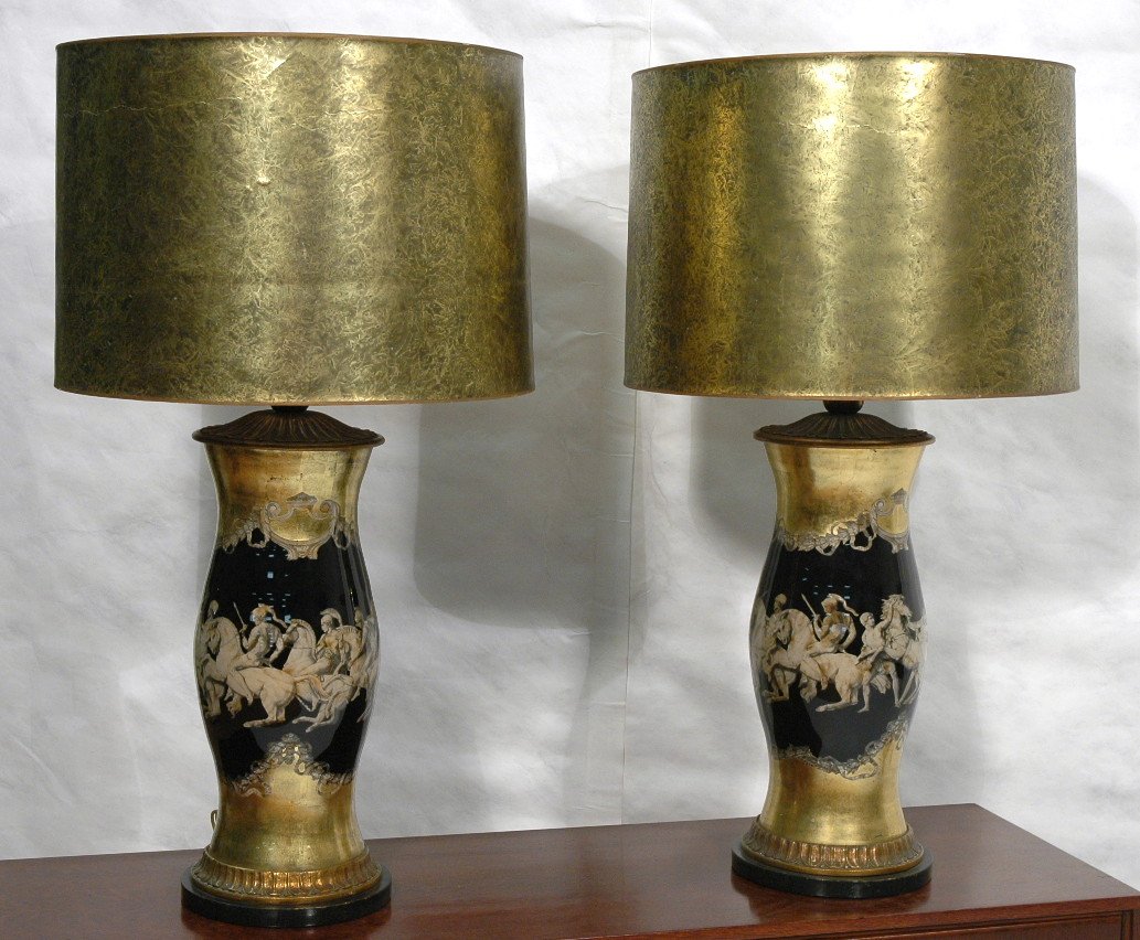 Pr Reverse Painted Glass Fornasetti style Table L: Pr Reverse Painted Glass Fornasetti style Table Lamps. Classical Form Glass with gilt & hand painted Roman horses & riders. Matching original drum shades. -- Dimensions: H: 34.5 inches: W: 22 inches -