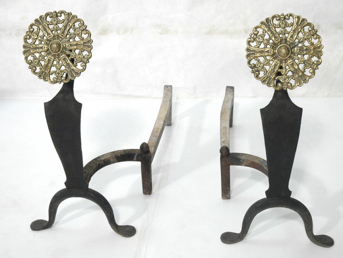 Decorator Brass & Iron Andirons. Large round bras: Decorator Brass & Iron Andirons. Large round brass floret. Marked: MO KINNEY. -- Dimensions: H: 21.75 inches: W: 10.5 inches: D: 23.5 inches ---