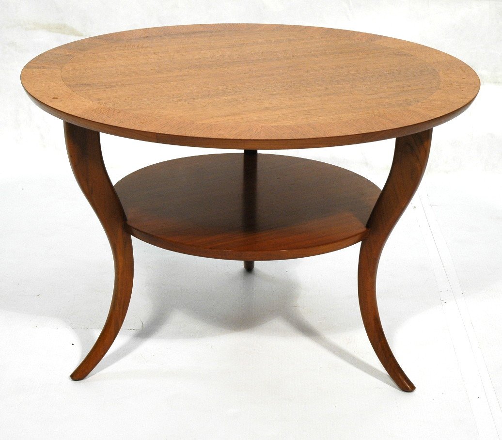 ROBSJOHN GIBBINGS style Round Coffee Table. Cockt: ROBSJOHN GIBBINGS style Round Coffee Table. Cocktail table with lower shelf. Three bowed legs. BEXLEY HEATH Ltd metal tag. -- Dimensions: H: 20 inches: W: 30 inches ---