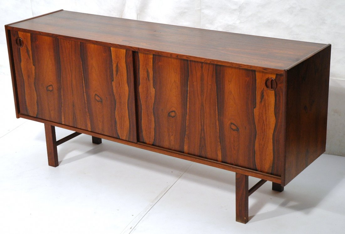 Rosewood Credenza with 2 Sliding Doors. Nicely d: Rosewood Credenza with 2 Sliding Doors. Nicely designed pulls. Not marked. -- Dimensions: H: 29.5 inches: W: 63 inches: D: 17.75 inches ---