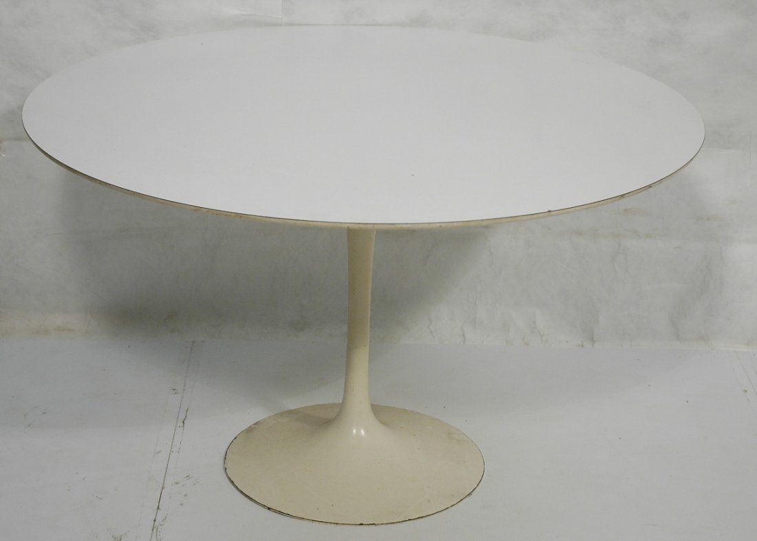 EERO SAARINEN Tulip Dining Table for KNOLL. White: EERO SAARINEN Tulip Dining Table for KNOLL. White enamel base. White Formica top. Dated: December 23, 1970.-- Dimensions: H: 29 inches: W: 48 inches ---