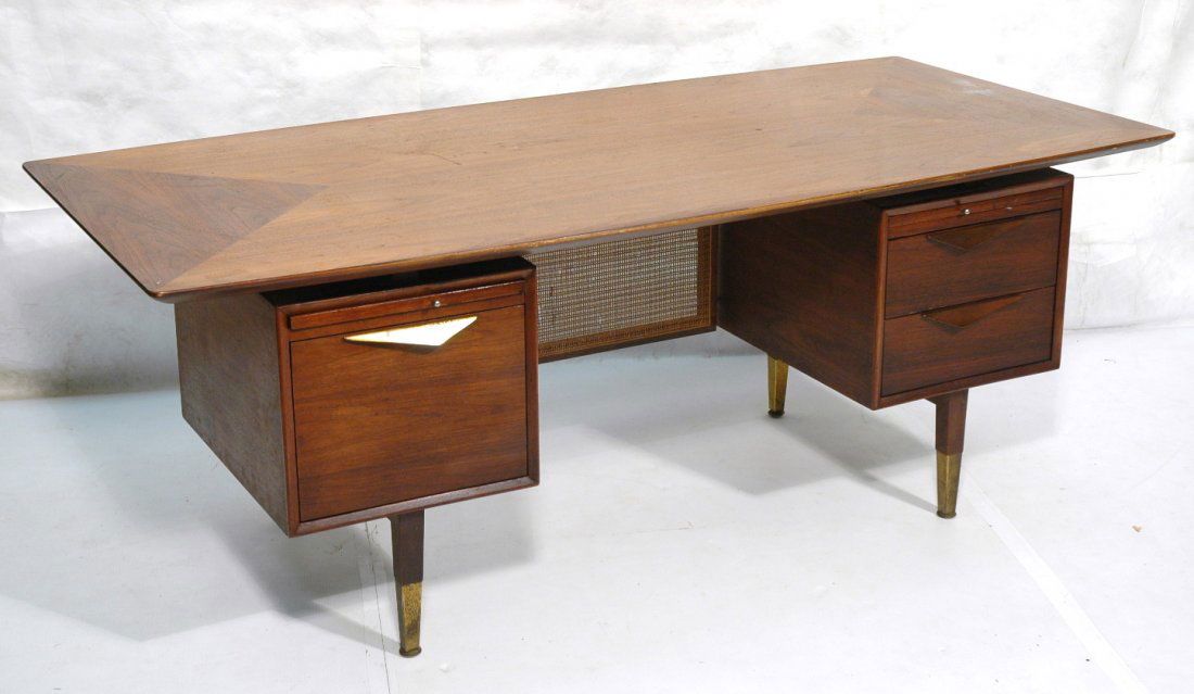 American Modern Executive Desk. Walnut desk with: American Modern Executive Desk. Walnut desk with brass angled hardware. Caned privacy screen. -- Dimensions: H: 29 inches: W: 78 inches: D: 36 inches ---