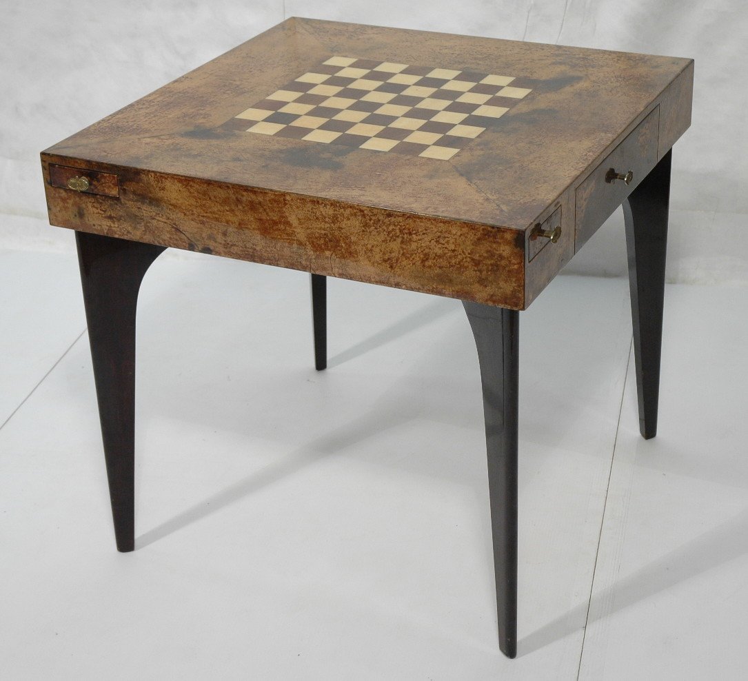 ALDO TURA Goatskin Lacquered Chess Checkers Table: ALDO TURA Goatskin Lacquered Chess Checkers Table. Four pull out drawers with ashtrays. One large drawer.-- Dimensions: H: 29.5 inches: W: 31.5 inches: D: 31.5 inches ---