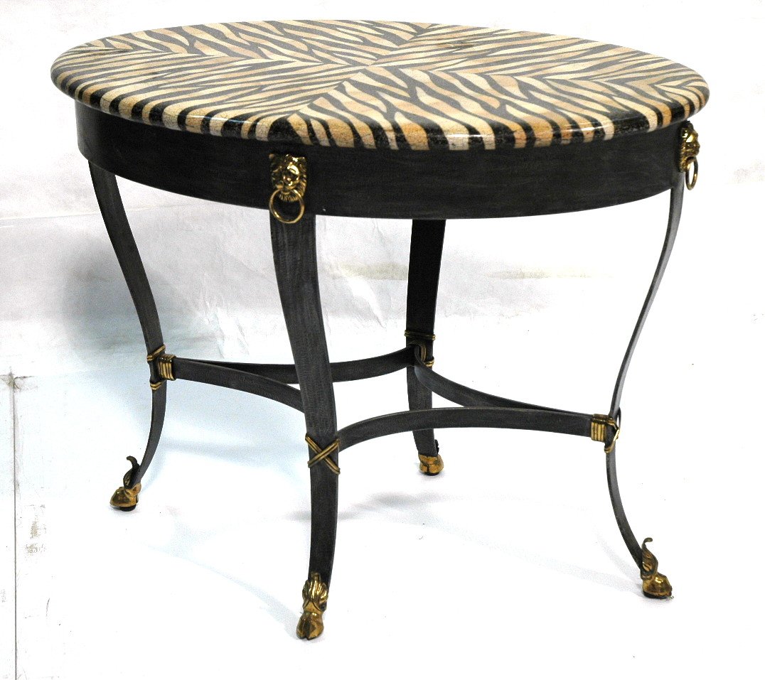 Decorator MAITLAND SMITH Oval Side Table. Zebra D: Decorator MAITLAND SMITH Oval Side Table. Zebra Design Terrazzo Oval Top. Blackened iron base with brass lion heads. rope trim & hoof feet. Label. -- Dimensions: H: 24.5 inches: W: 30 inches: D: 20 in