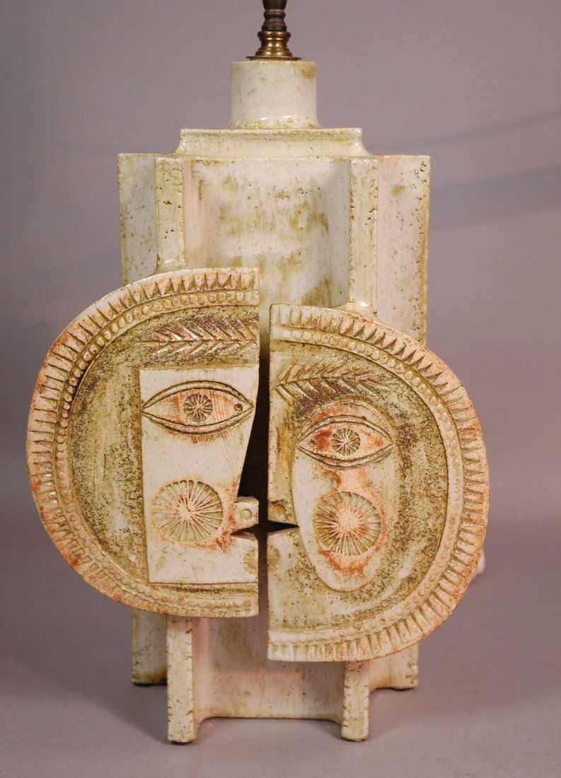 ROGER CAPRON Vallauris Large Ceramic Table Lamp.: ROGER CAPRON Vallauris Large Ceramic Table Lamp. Split sun face. Heavy construction. Sun face with stamped relief design. Marked. -- Dimensions: H: 32 inches: W: 11 inches: D: 7 inches ---