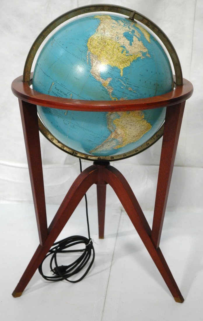Edward Wormley Globe on Stand. Metal capped feet: Edward Wormley Globe on Stand. Metal capped feet. Electrified globe.-- Dimensions: H: 33 inches: W: 20 inches ---