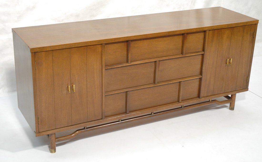 American Modern Credenza Sideboard. Four doors. T: American Modern Credenza Sideboard. Four doors. Three drawers. Decorative drawer fronts. -- Dimensions: H: 31 inches: D: 19 inches: L: 72 inches ---