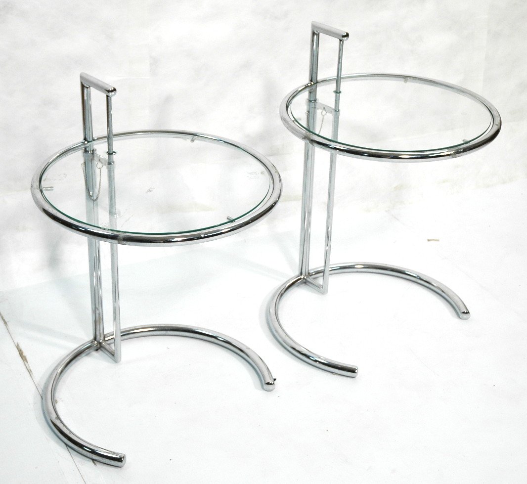 Pr EILEEN GRAY Side Tables. Round form with glass: Pr EILEEN GRAY Side Tables. Round form with glass tops. Adjustable Height.-- Dimensions: H: 28 inches: W: 21 inches: D: 17 inches ---