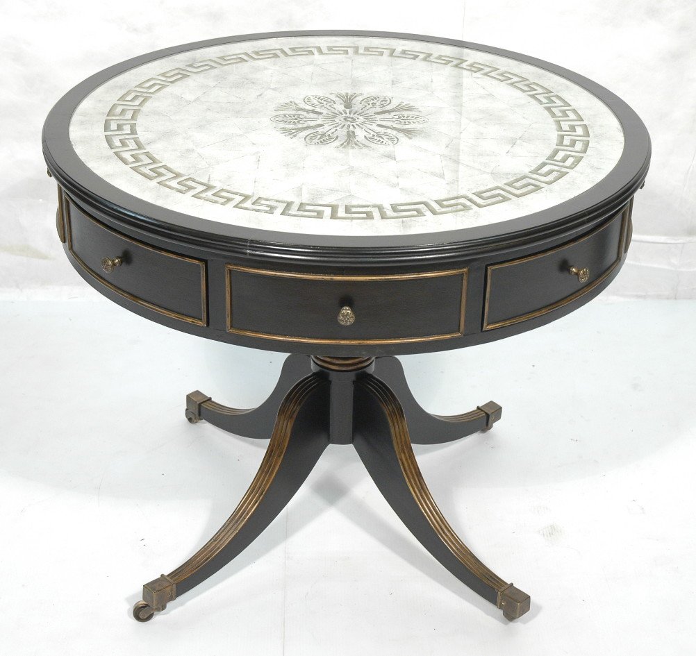 JOHN RICHARD Regency Style Drum Table. Silver Lea: JOHN RICHARD Regency Style Drum Table. Silver Leaf Eglomise Top. Ebonized finish frame with gold highlights. European Crossroads Collection. -- Dimensions: H: 30.5 inches: W: 37 inches: D: 37 inches -