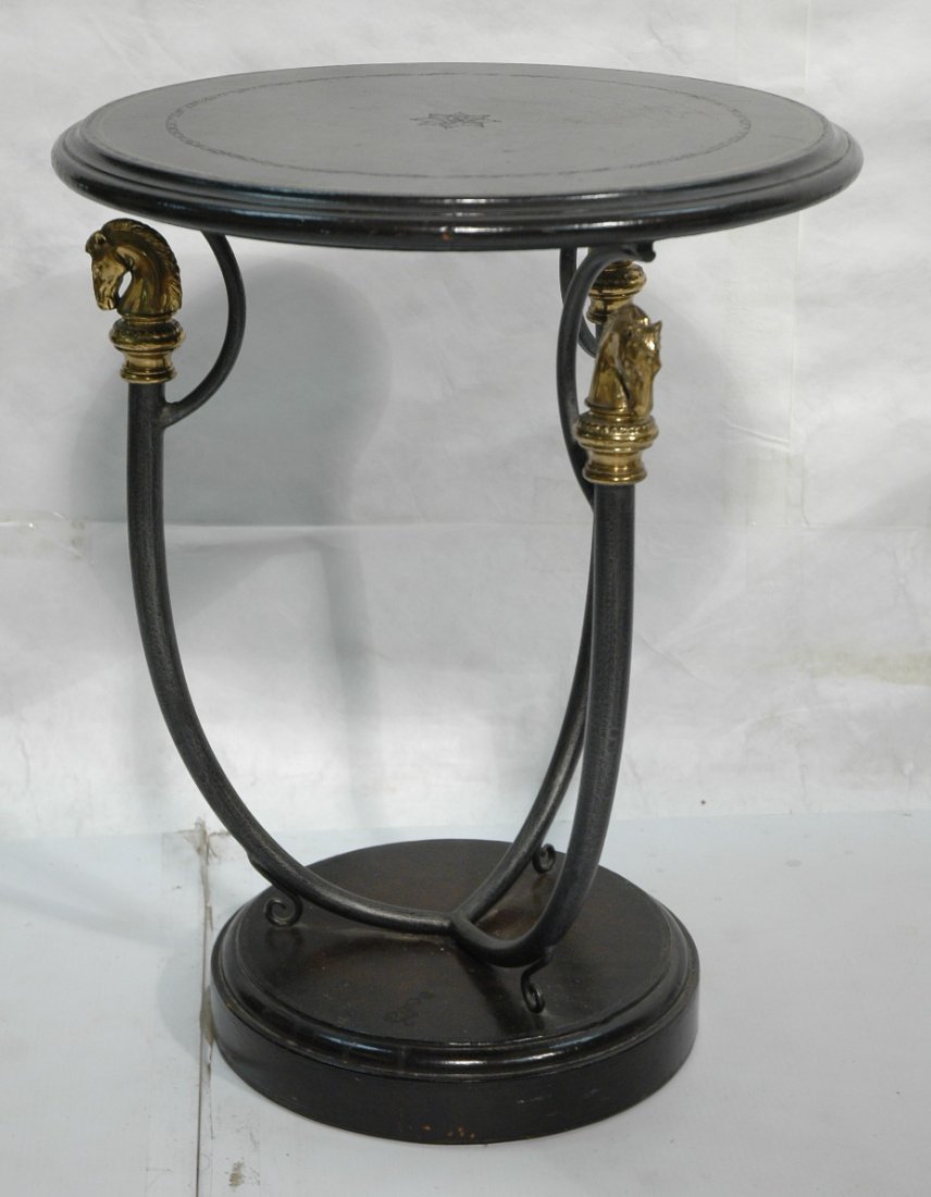 MAITLAND SMITH Leather Top Tabouret Table. Iron B: MAITLAND SMITH Leather Top Tabouret Table. Iron Base with brass horse Heads. Embossed design to leather. -- Dimensions: H: 25.5 inches: W: 20 inches ---