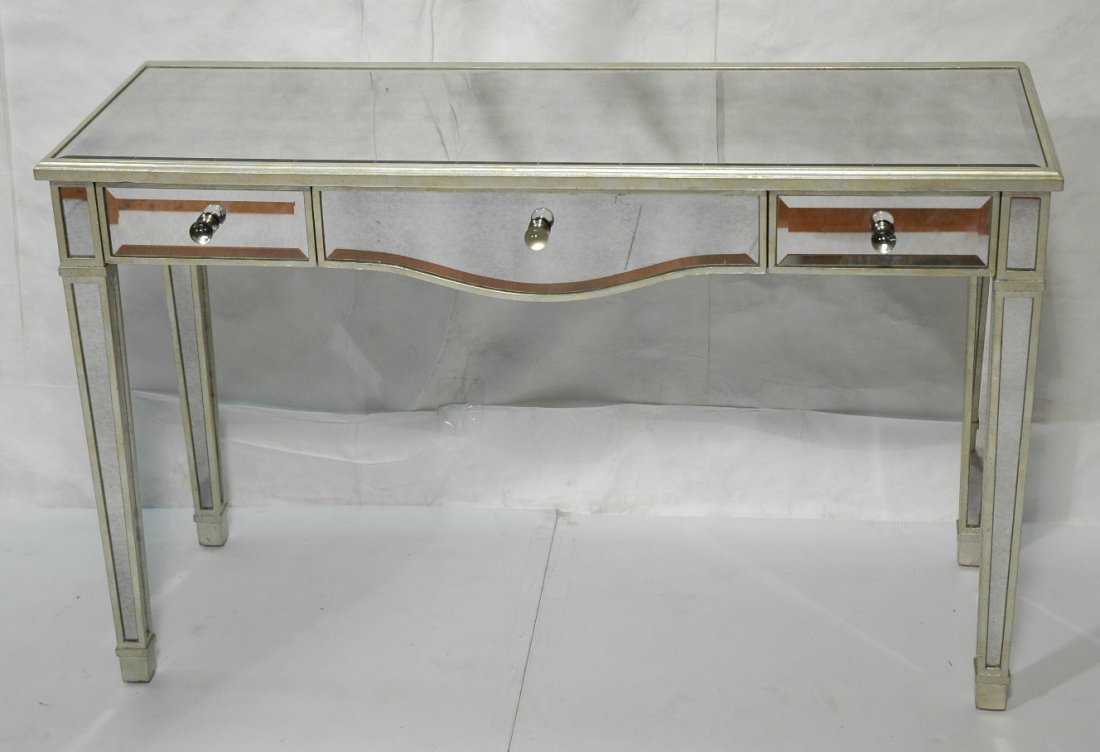 LILLIAN AUGUST Mirrored Vanity Desk. Antiqued Mir: LILLIAN AUGUST Mirrored Vanity Desk. Antiqued Mirrored panels on silvered wood frame. Beveled mirrors. Lucite knobs. Knobs can be switched out with metal knobs (included). -- Dimensions: H: 30.25 inch