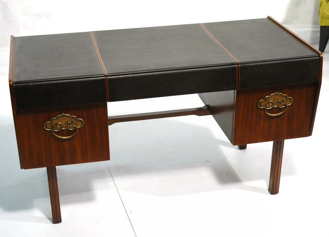 JOHN WIDDICOMB Leather Top 5 Drawer Desk. America: JOHN WIDDICOMB Leather Top 5 Drawer Desk. American Modern Desk. Two lower drawers with large sculptural Asian style brass pulls. Three upper leather covered drawers. Branded mark.-- Dimensions: H: 29.