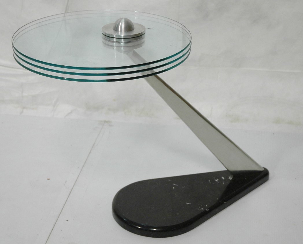 KAISER NEWMAN Futurist Steel & Glass Side Table.: KAISER NEWMAN Futurist Steel & Glass Side Table. Three round tier glass top. Black marble base.-- Dimensions: H: 21 inches: W: 16 inches: D: 28.5 inches ---