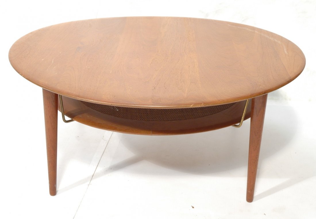 Peter Hvidt Danish Modern Teak Round Coffee Table: Peter Hvidt et Orla Molgaard for France and Son Two Tier Danish Modern Teak Round Coffee Table. JOHN STUART. Lower shelf with woven rattan center suspended from brass rods. -- Dimensions: H: 16 inches