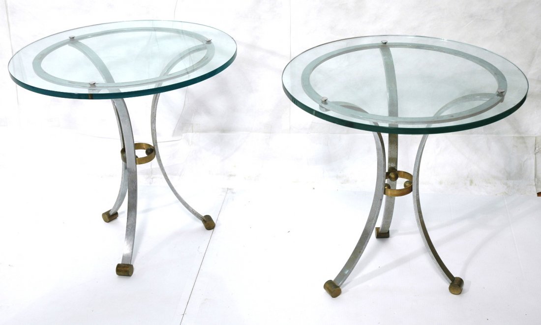 Pr MAISON JANSEN Chrome Glass Tabouret Tables. Ch: Pr MAISON JANSEN Chrome Glass Tabouret Tables. Chromed steel frames with brass capped feet and ring. 3/4" thick glass top. Not marked.-- Dimensions: H: 27.5 inches: W: 28 inches: D: 28 inches ---