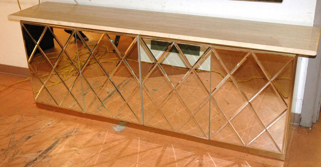 Mirrored Door Credenza Sideboard. Diamond Shaped: Mirrored Door Credenza Sideboard. Diamond Shaped mirror panel doors. Cream cabinet with travertine top. One cabinet with 6 interior drawers.-- Dimensions: H: 31 inches: D: 17.5 inches: L: 86.5 inches