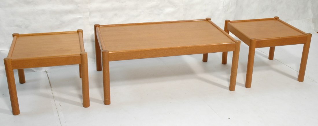 Danish Modern Teak Tables. Coffee and End Tables: Danish Modern Teak Tables. Coffee and End Tables. Round column legs. Marked: Domino Mobler.-- Dimensions: H: 19.5 inches: W: 48.25 inches: D: 29.5 inches ---