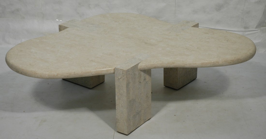 MAITLAND Smith Tessellated Stone Coffee Cocktail: MAITLAND Smith Tessellated Stone Coffee Cocktail Table. Biomorphic form on three legs. Rolled edge.-- Dimensions: H: 16.5 inches: W: 52 inches: D: 60 inches ---