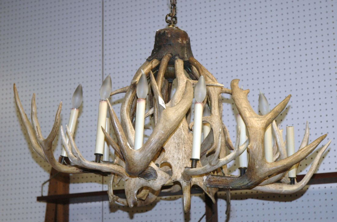 Large Antler Hanging Light Chandelier. Adirondack: Large Antler Hanging Light Chandelier. Adirondack style. Candle fixtures hold bulbs. -- Dimensions: H: 23 inches: W: 35 inches: D: 35 inches ---