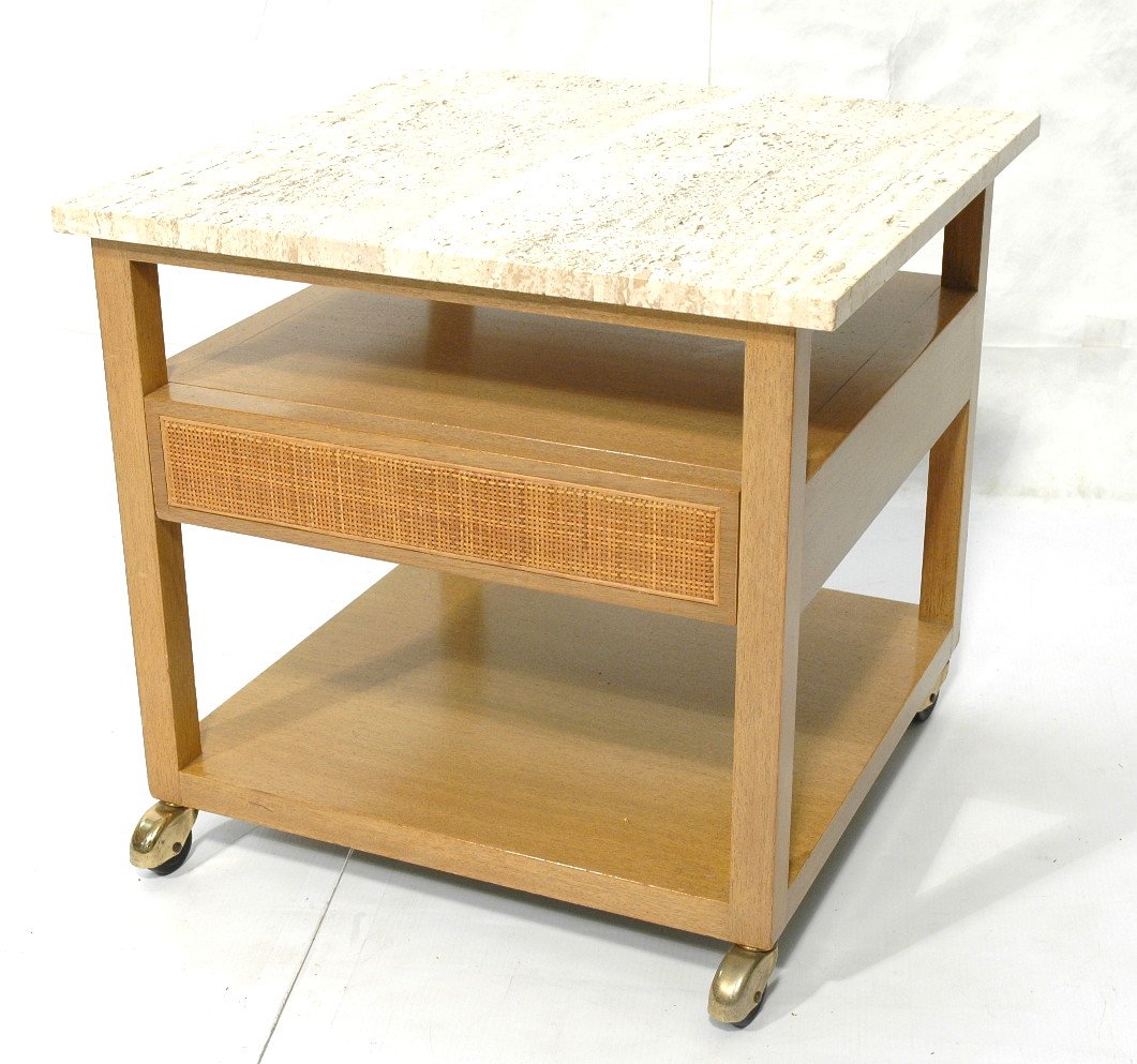 HARVEY PROBBER Square Travertine Square Table. Tr: HARVEY PROBBER Square Travertine Square Table. Travertine Top on Light Wood Rolling Side Table. One woven front drawer. Probber label. -- Dimensions: H: 23 inches: W: 24 inches: D: 24 inches ---